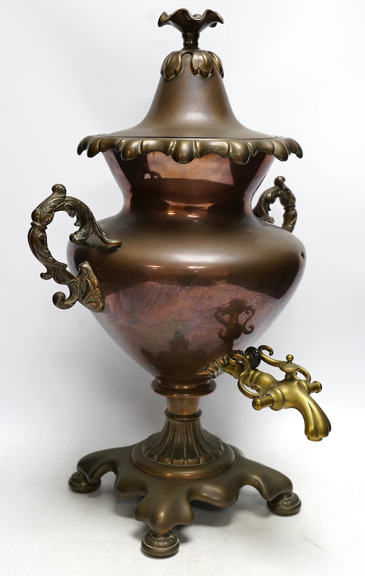 A Victorian copper and brass tea urn, 51cm. Condition - fair                                                                                                                                                                