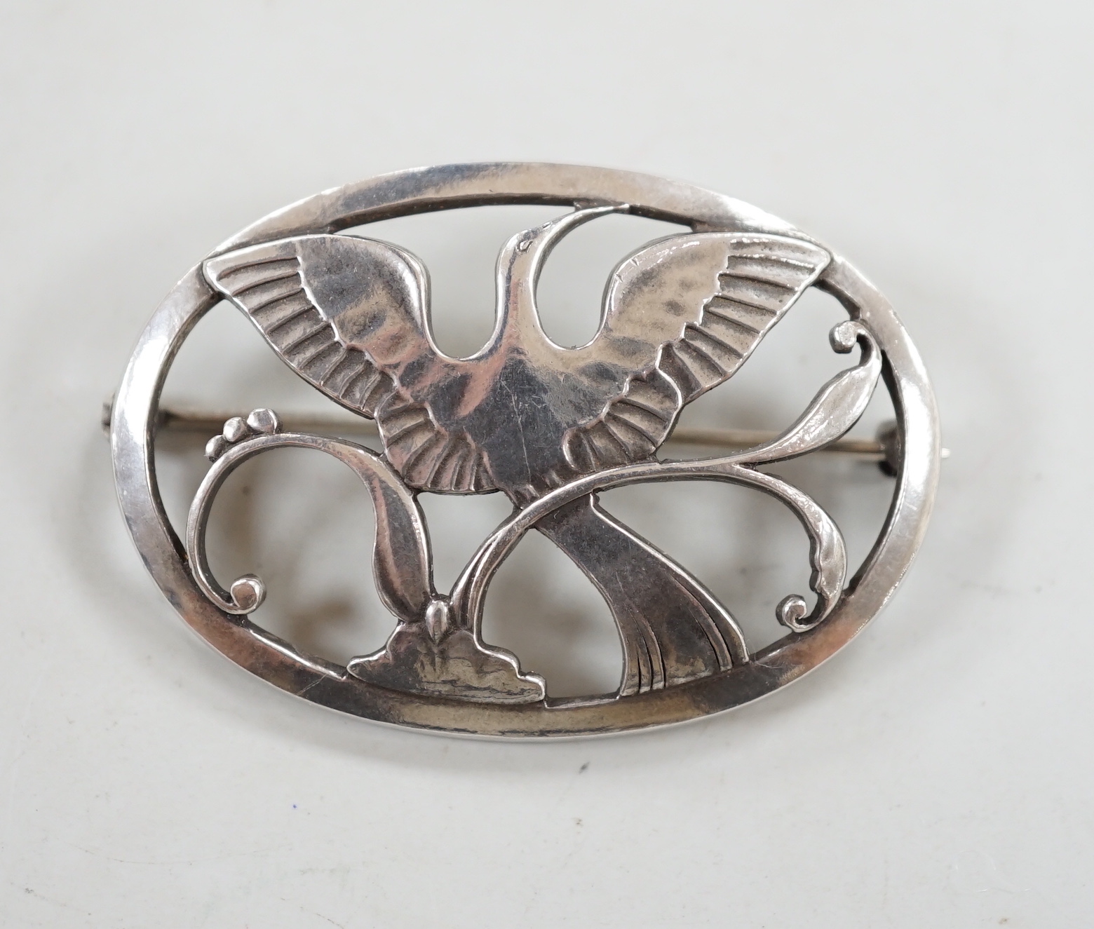 A Georg Jensen sterling oval 'Bird of Paradise' brooch, design no. 238, width 43mm.                                                                                                                                         