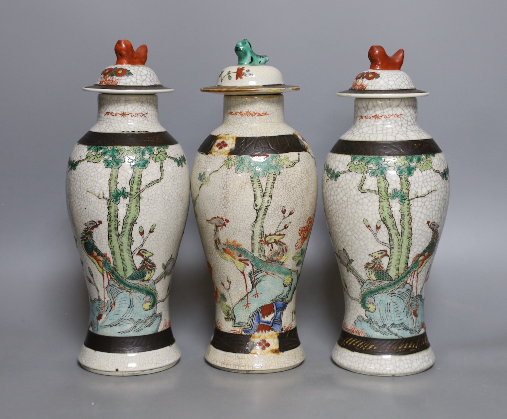 Three Chinese crackleware jars and covers, 26cm                                                                                                                                                                             