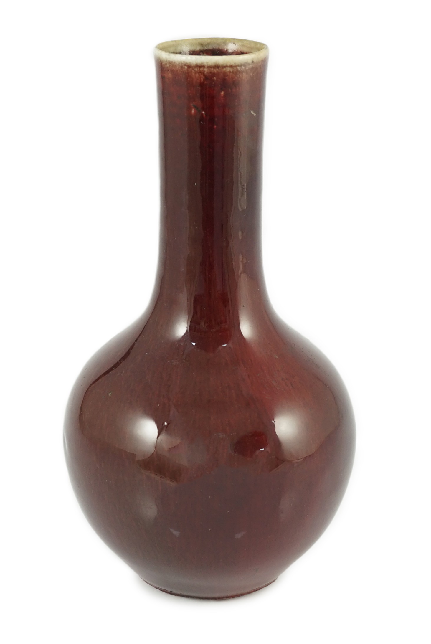 A Chinese sang-de-boeuf glazed bottle vase, 18th/19th century, 22.5cm high                                                                                                                                                  