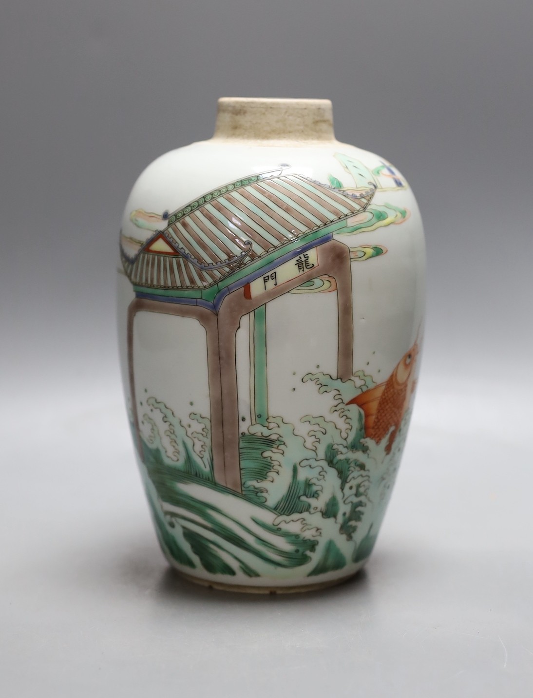 A Chinese famille verte ‘fish and dragon’ jar, lacking cover, 19cm                                                                                                                                                          