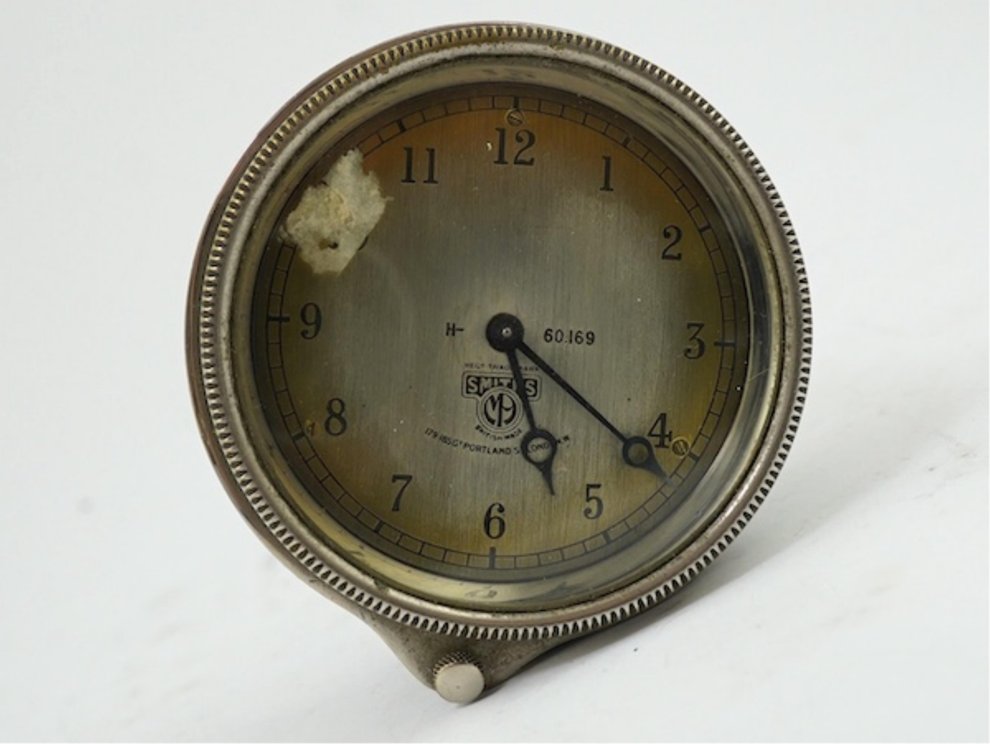 A Smiths car timepiece, dial 8.5cm. Condition - fair                                                                                                                                                                        