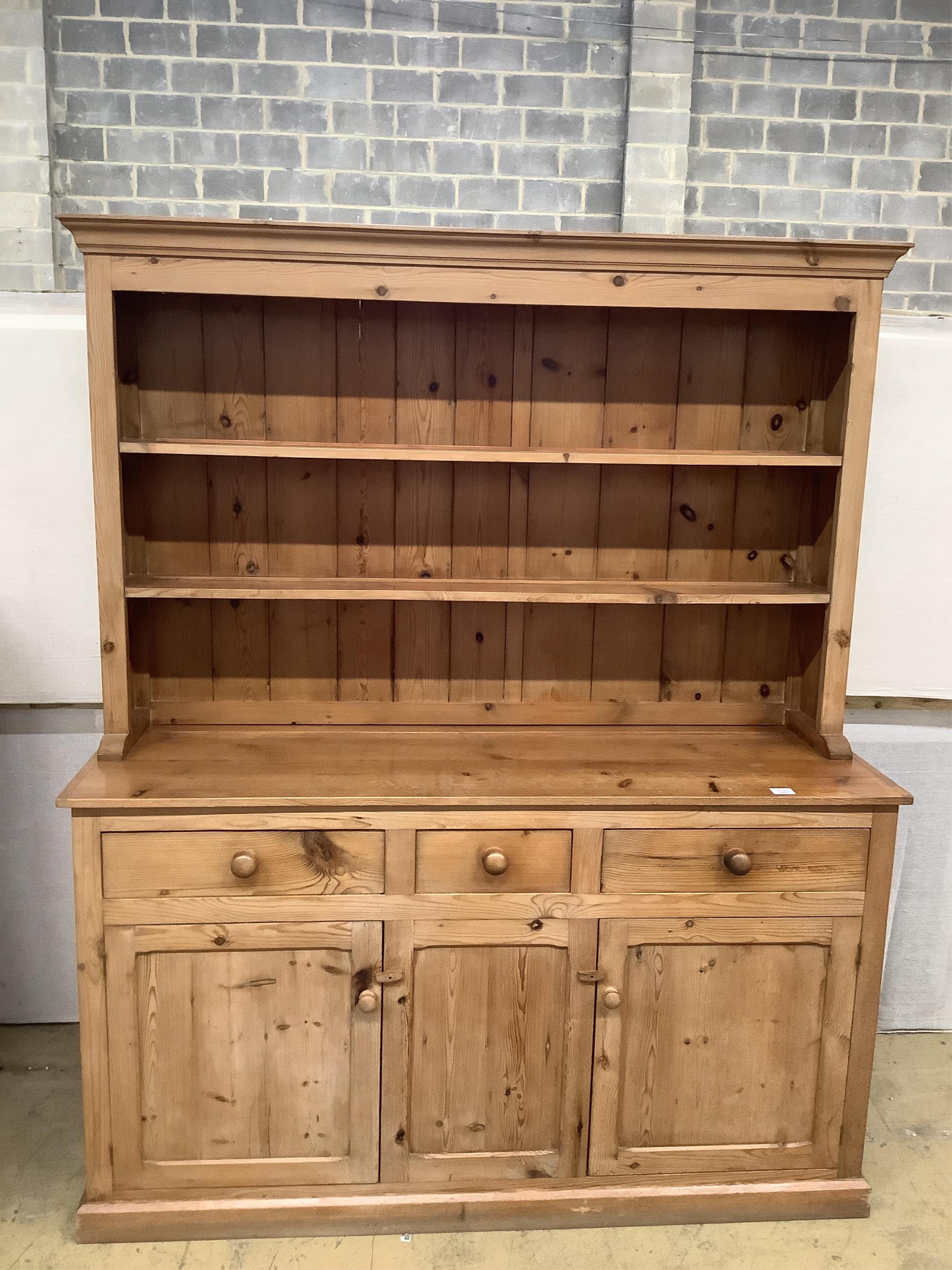 A Victorian style pine dresser, width 156cm, depth 52cm, height 190cm. Condition - fair                                                                                                                                     