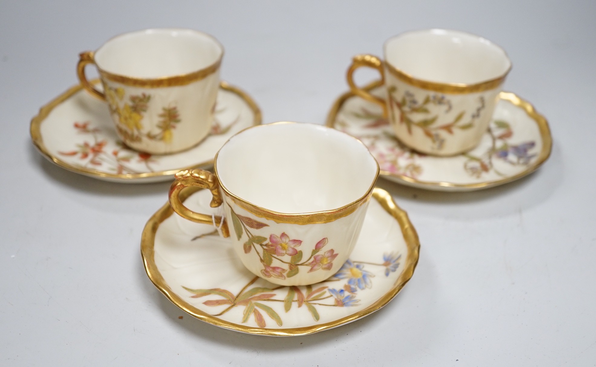 Three Royal Worcester cups and saucers                                                                                                                                                                                      