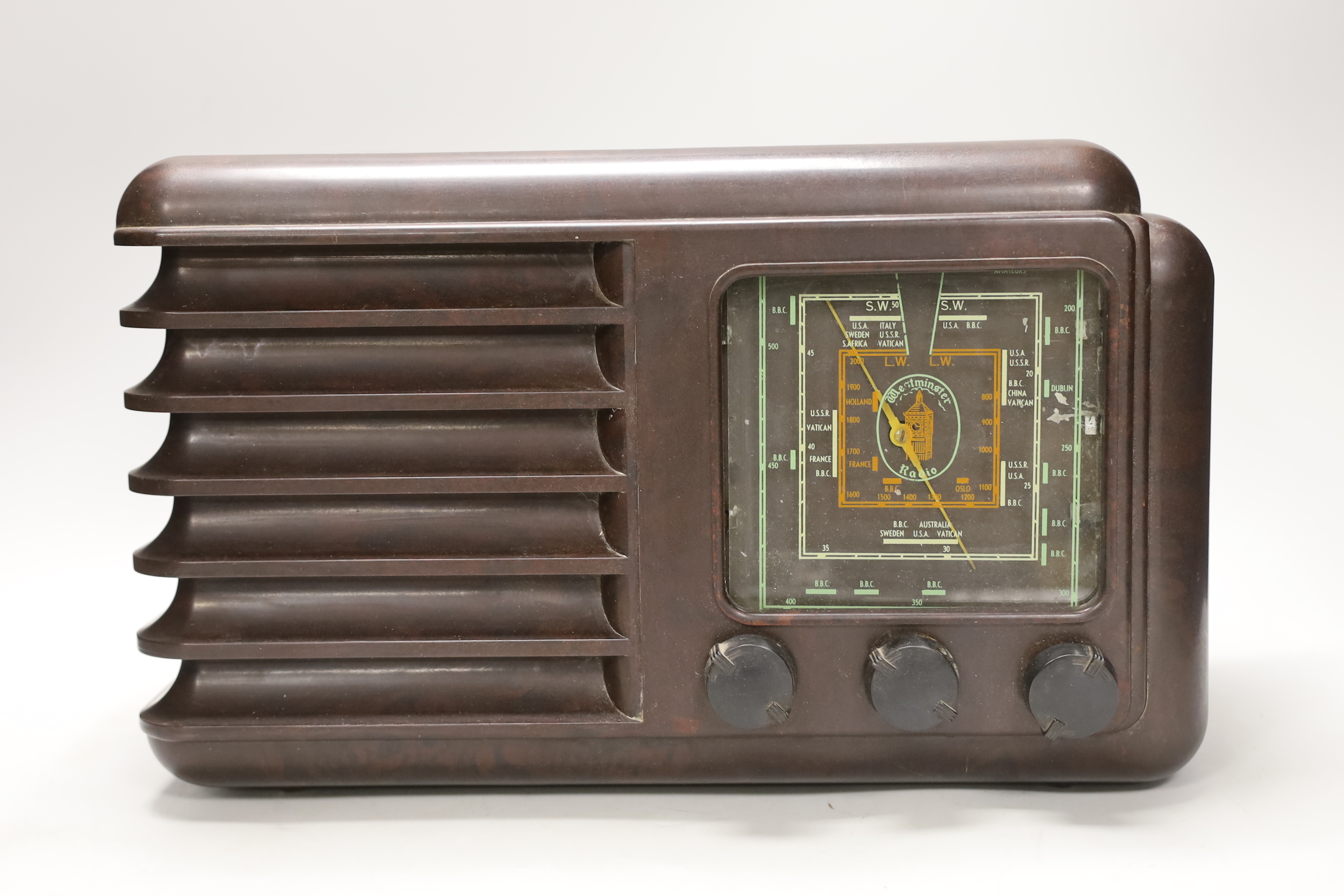 An Art Deco style brown Bakelite Westminster radio, 37cm wide                                                                                                                                                               