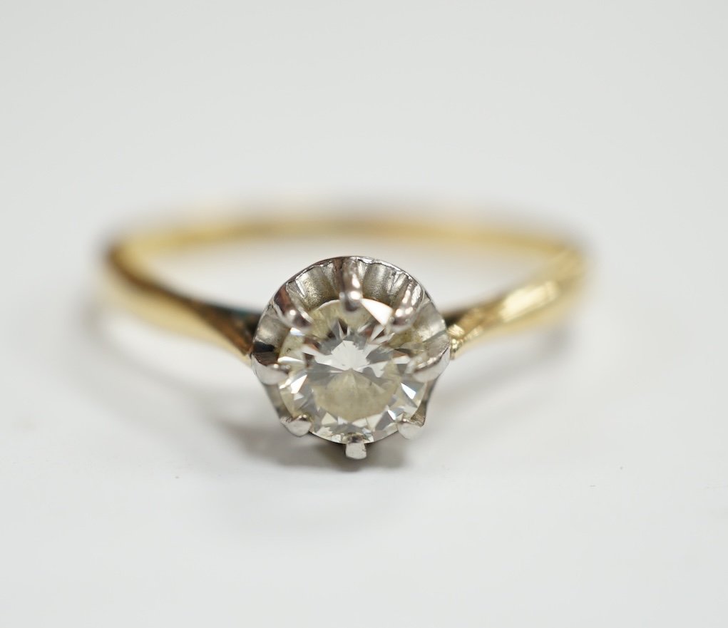 An early 20th century 18ct, plat and claw set solitaire diamond ring, size S, gross weight 2.8 grams.                                                                                                                       