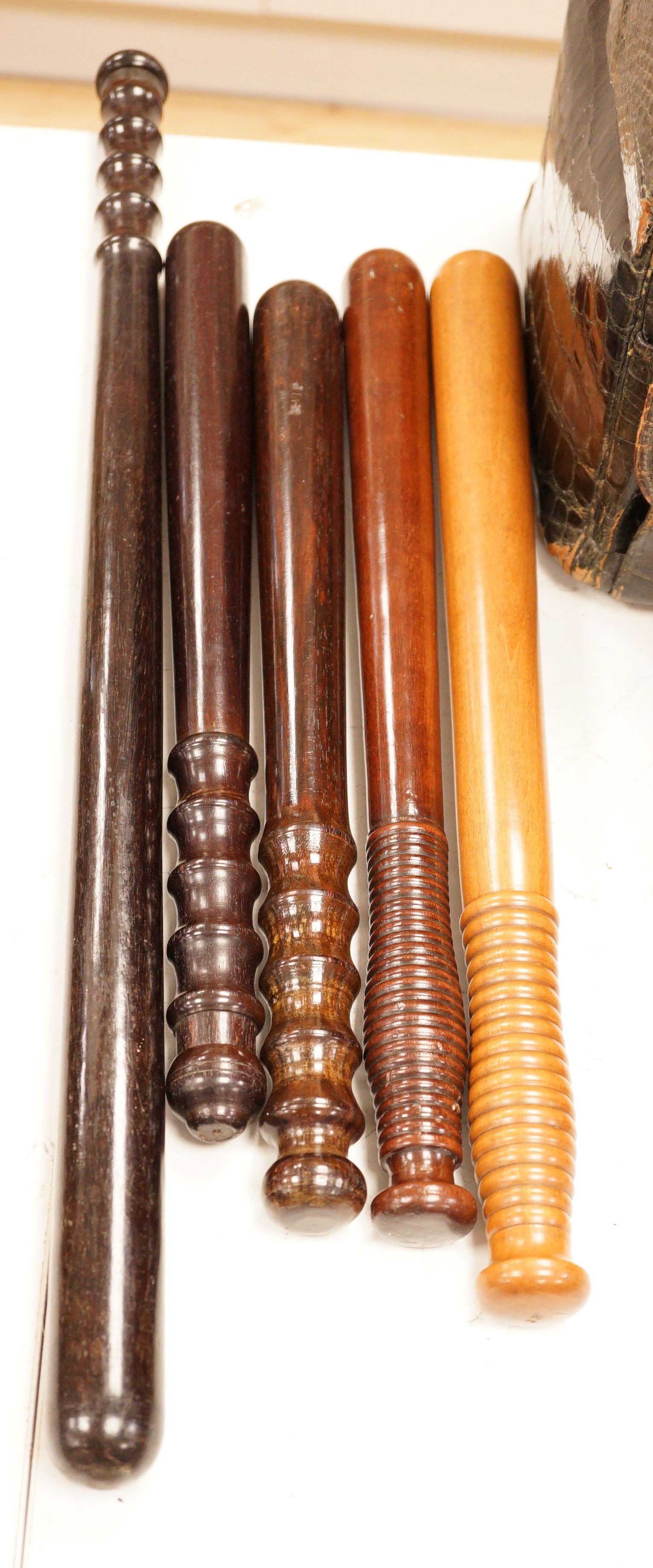 A collection of six assorted 19th century constabulary truncheons in varying woods                                                                                                                                          