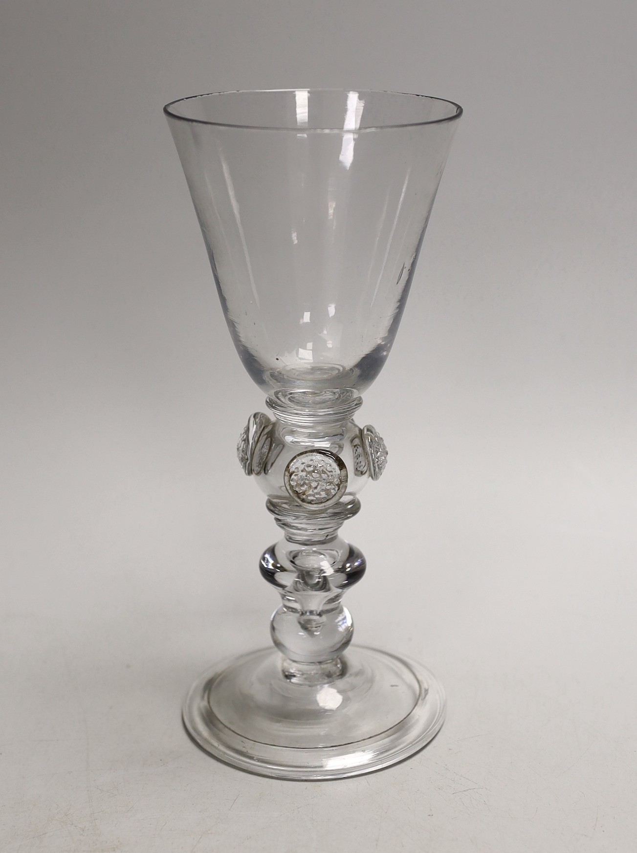 A Queen Anne coin stem glass goblet, c.1710, 19.8cm.                                                                                                                                                                        