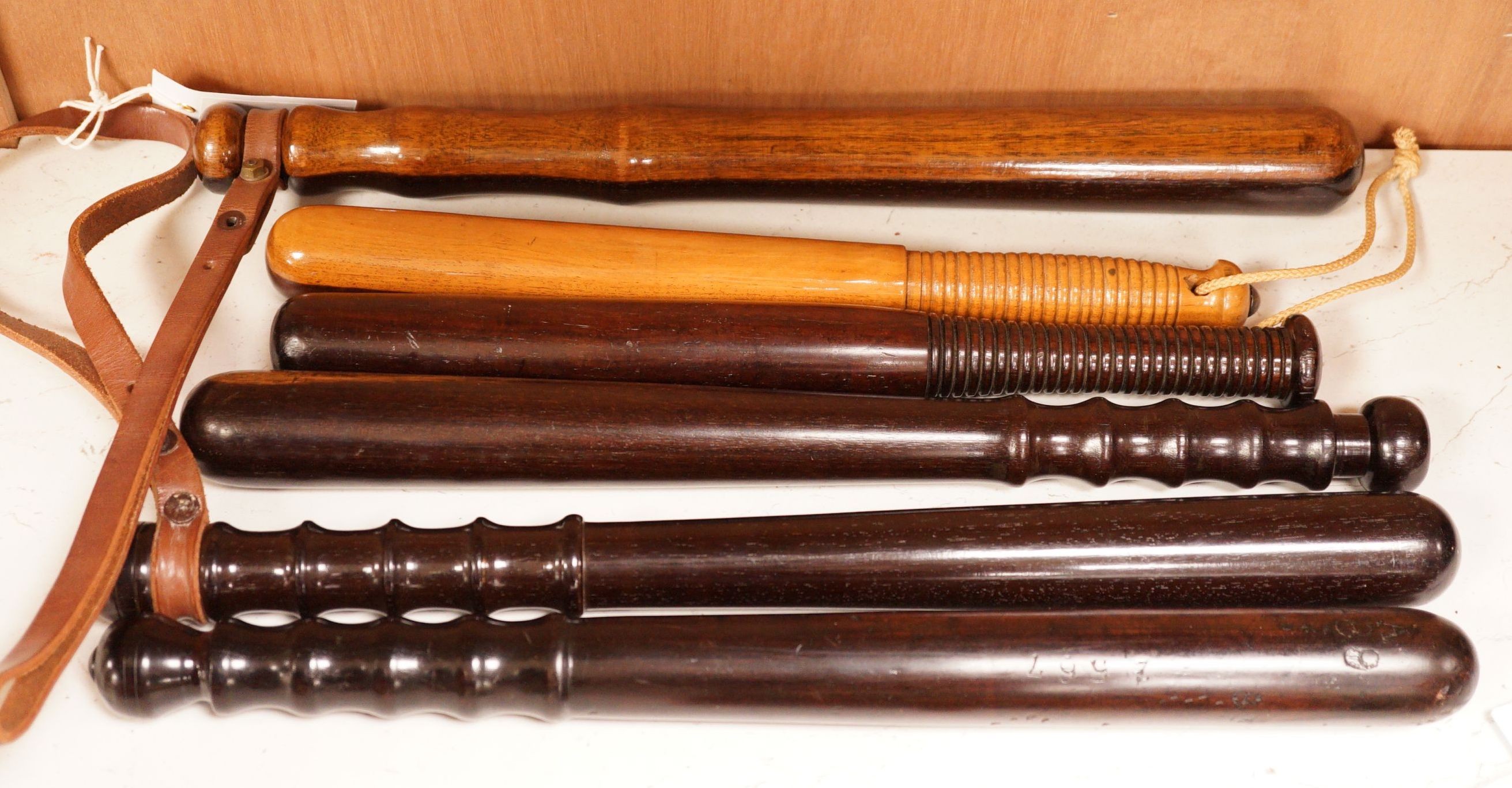 A collection of six assorted 19th century constabulary truncheons in varying woods                                                                                                                                          