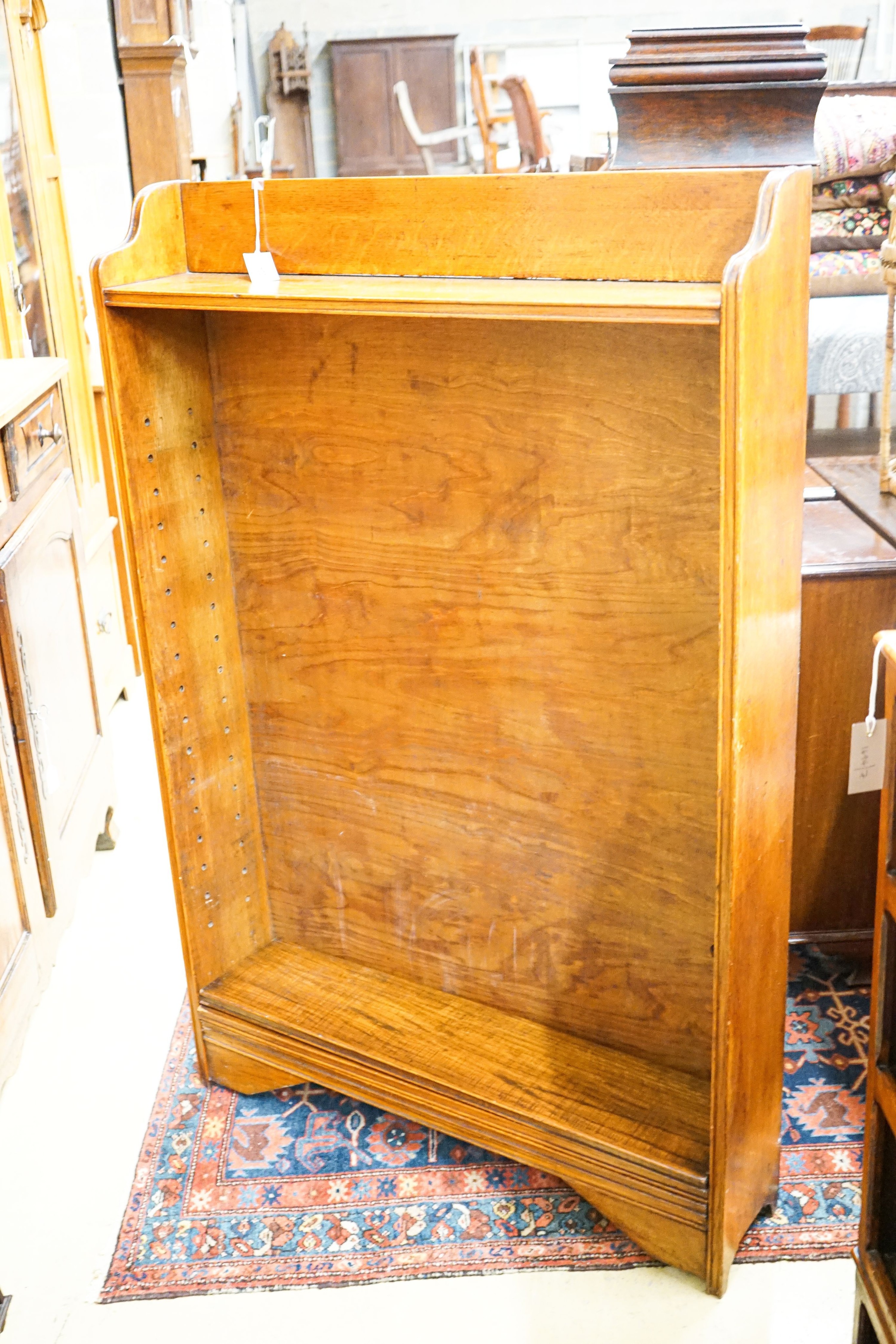 An early 20th century oak open bookcase, width 91cm, depth 20cm, height 140cm                                                                                                                                               