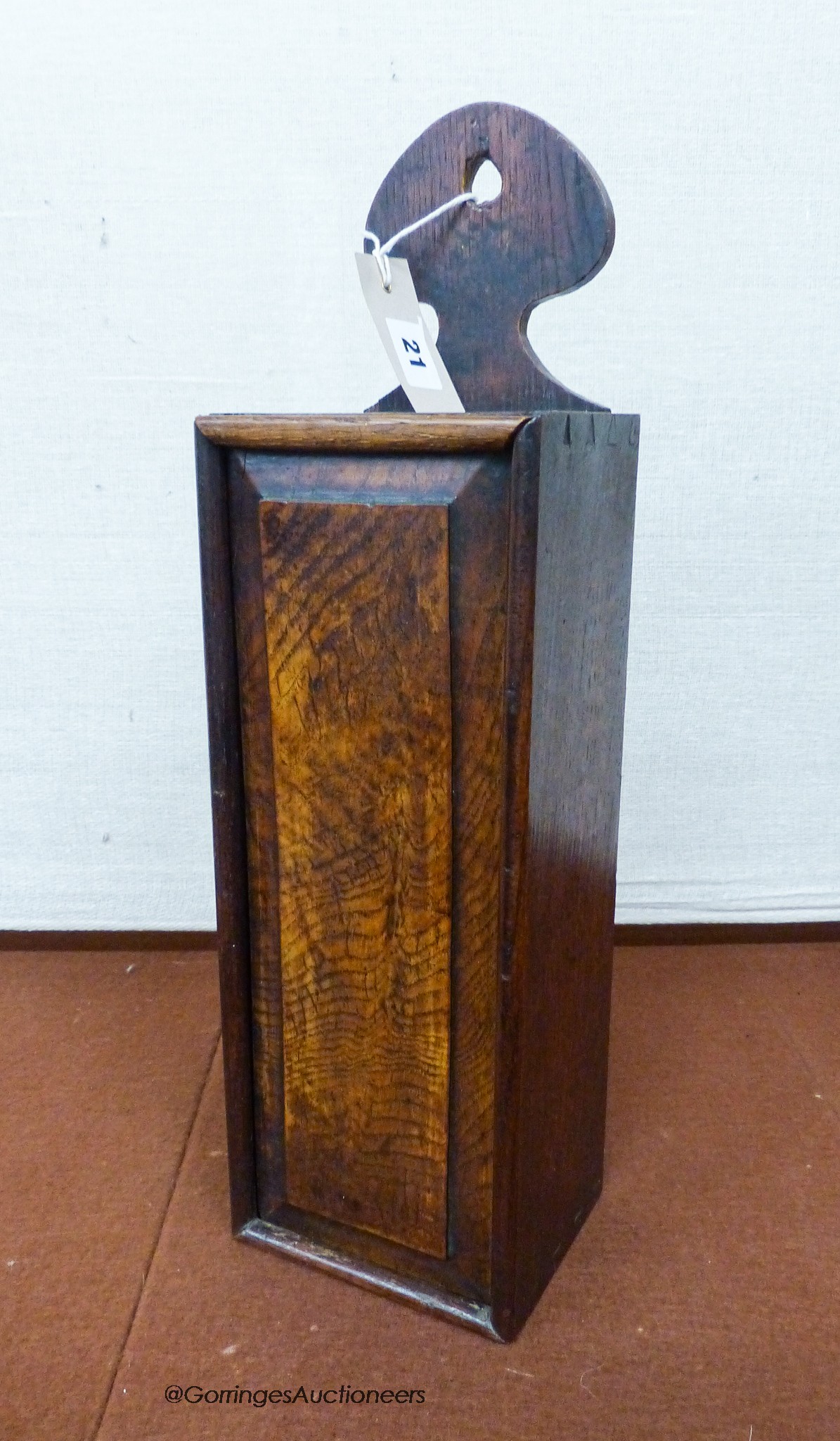 A George III oak hanging candle box, height 48cm                                                                                                                                                                            