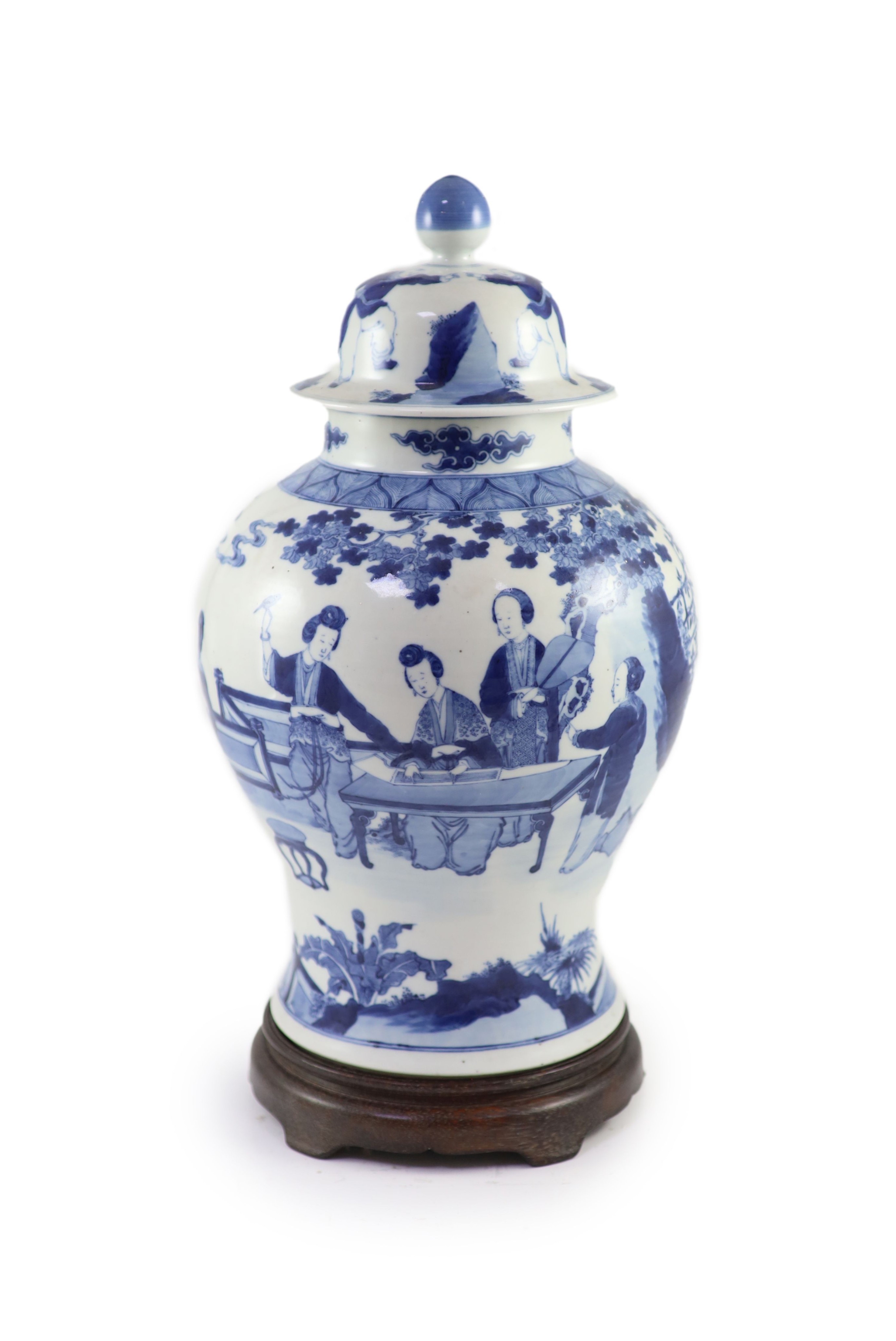A large Chinese blue and white ‘ladies’ vase, Kangxi mark, 19th century, 44cm high, wood stand                                                                                                                              