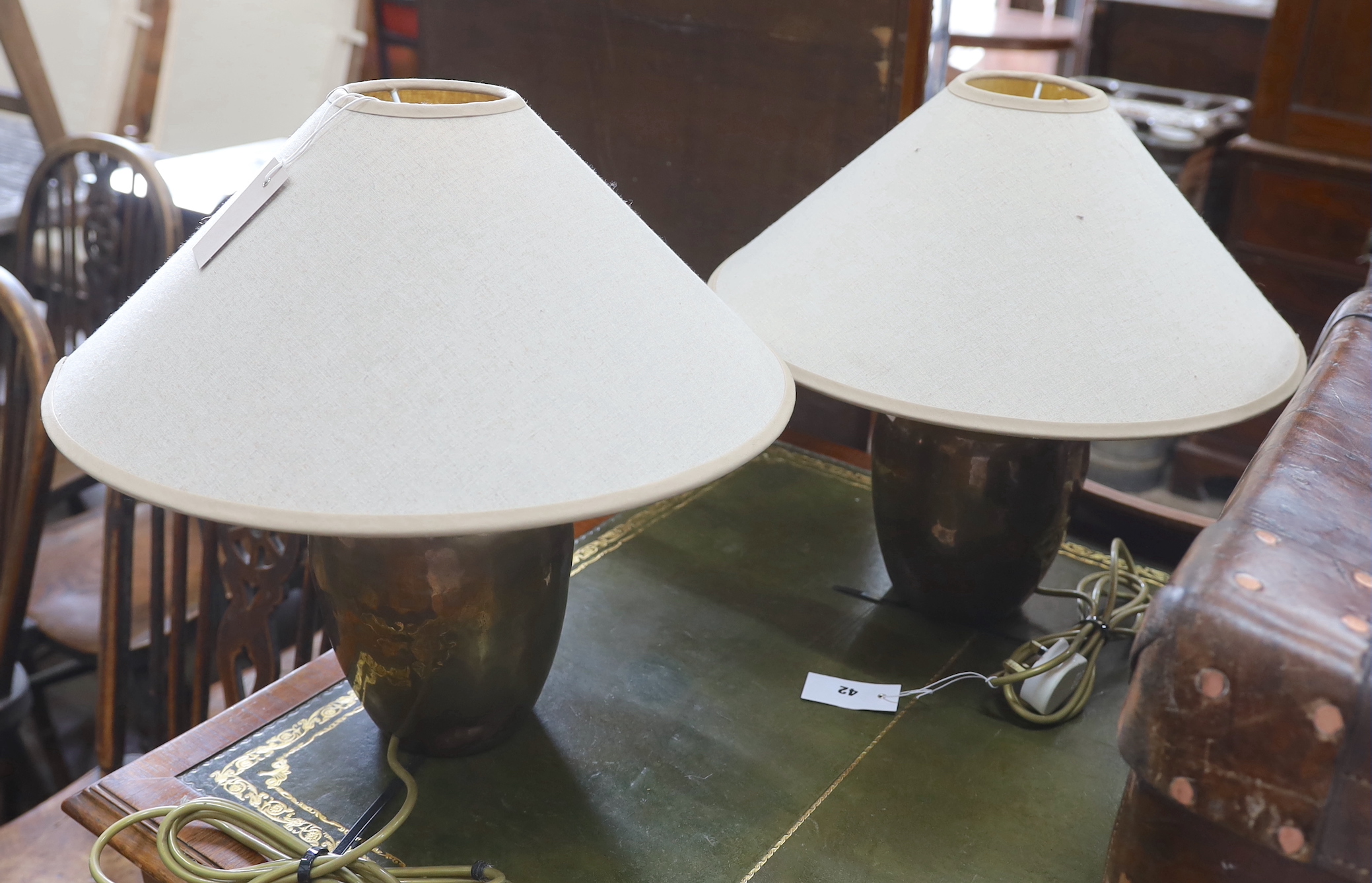 A pair of contemporary copper table lamps, with shades, height including shades 40cm                                                                                                                                        