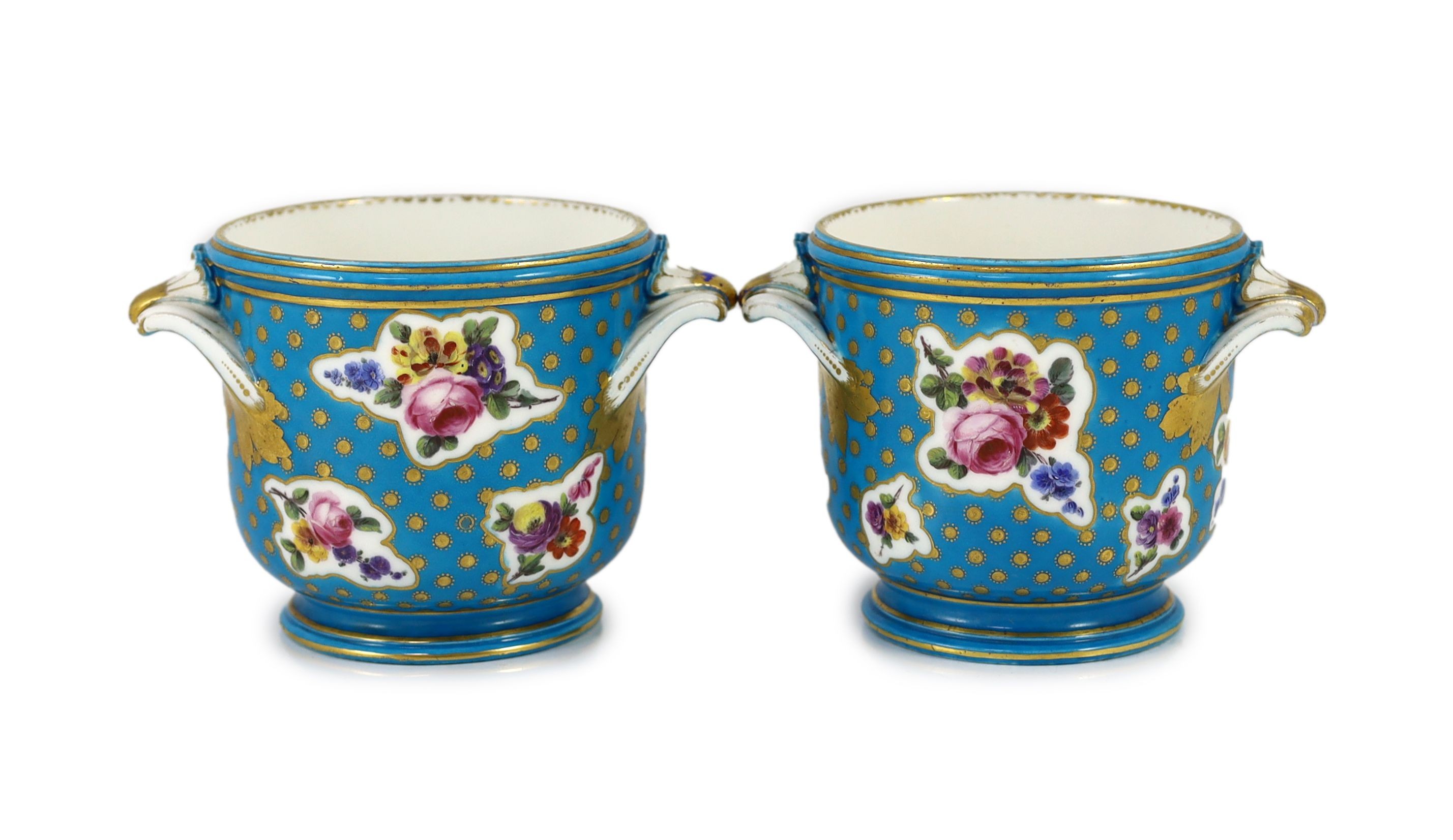 A pair of Sevres bottle coolers (seaux a bouteille) date code for 1764, 11cm highp                                                                                                                                          