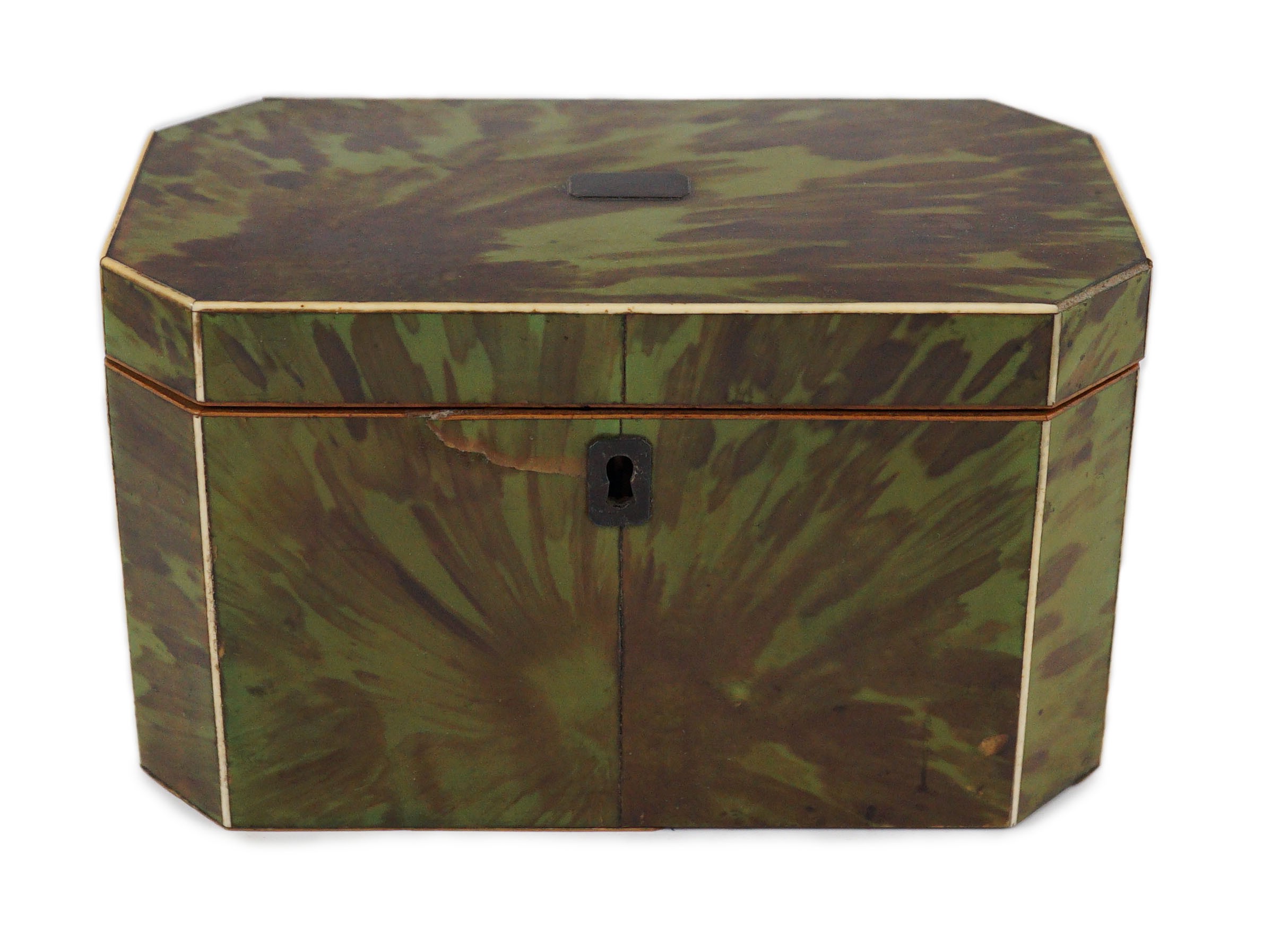A George III green stained tortoiseshell and ivory octagonal tea caddy, 18.5cm wide 9.5cm deep 11cm high                                                                                                                    