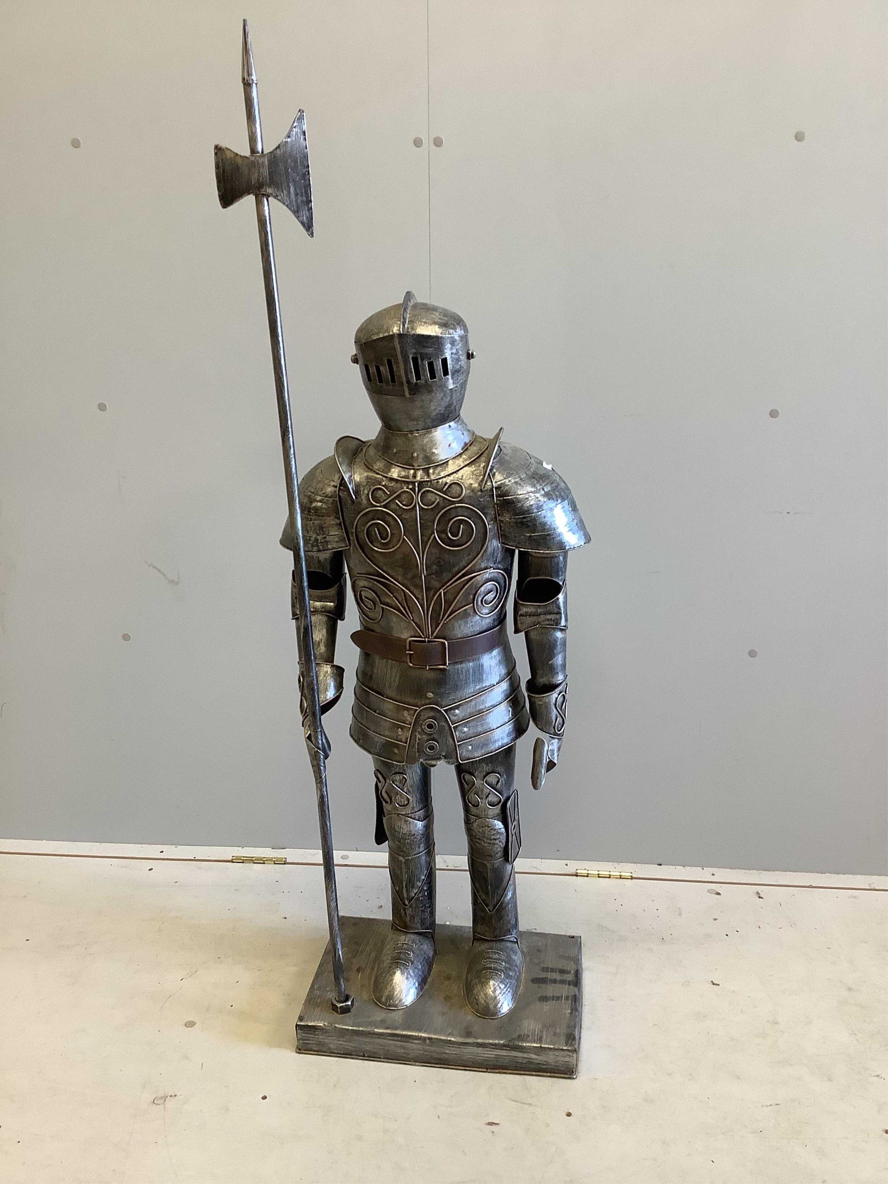 A metal miniature suit of armour, height 140cm                                                                                                                                                                              