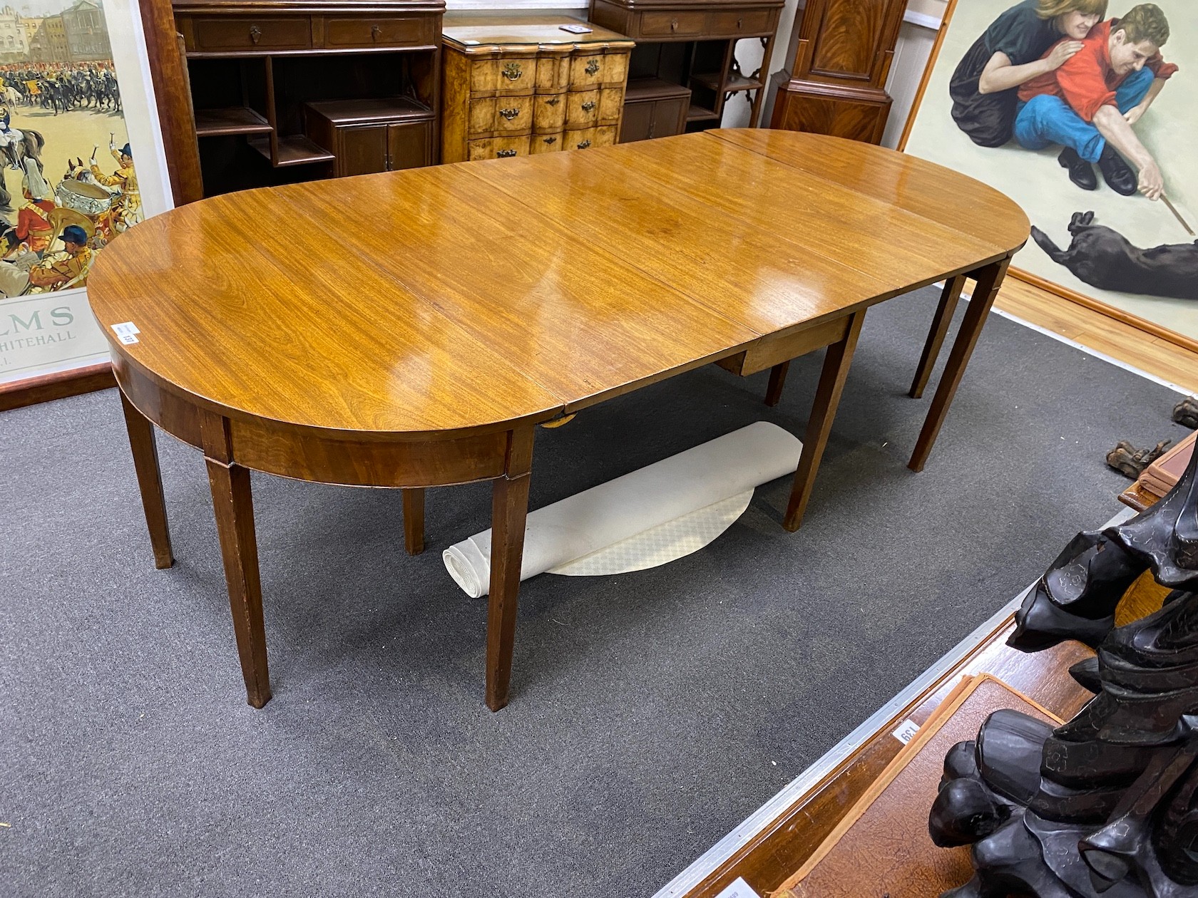 A George III mahogany extending D end dining table, 240cm extended, depth 105cm, height 70cm                                                                                                                                