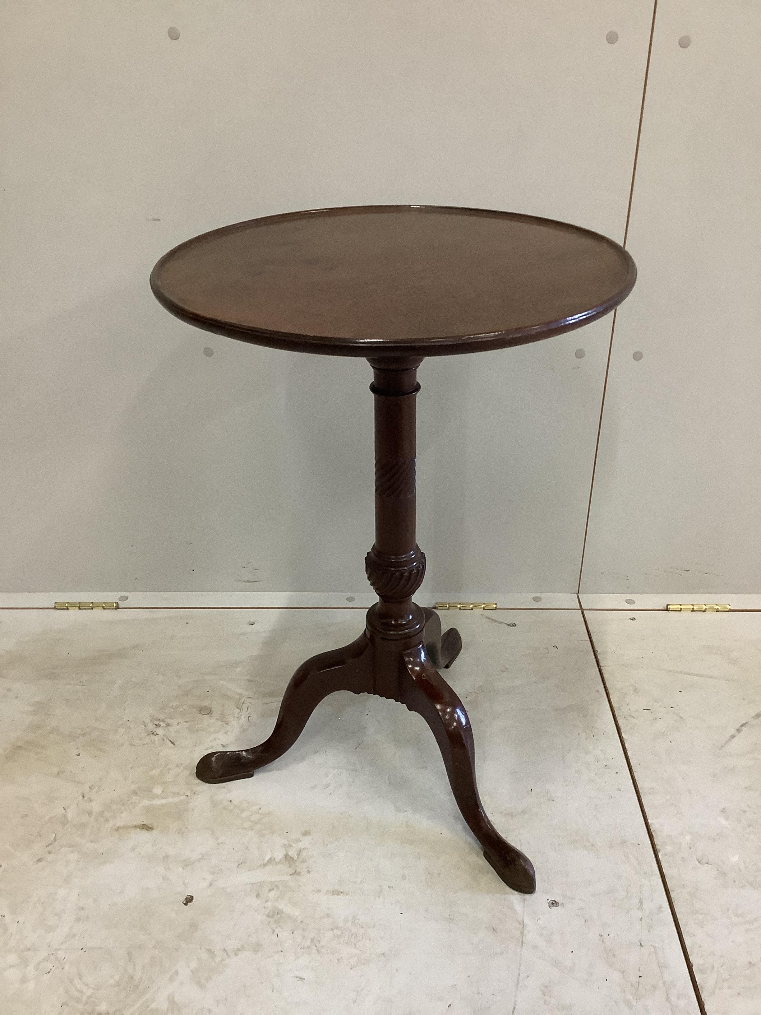 A George III style circular mahogany tripod wine table, diameter 48cm, height 72cm                                                                                                                                          