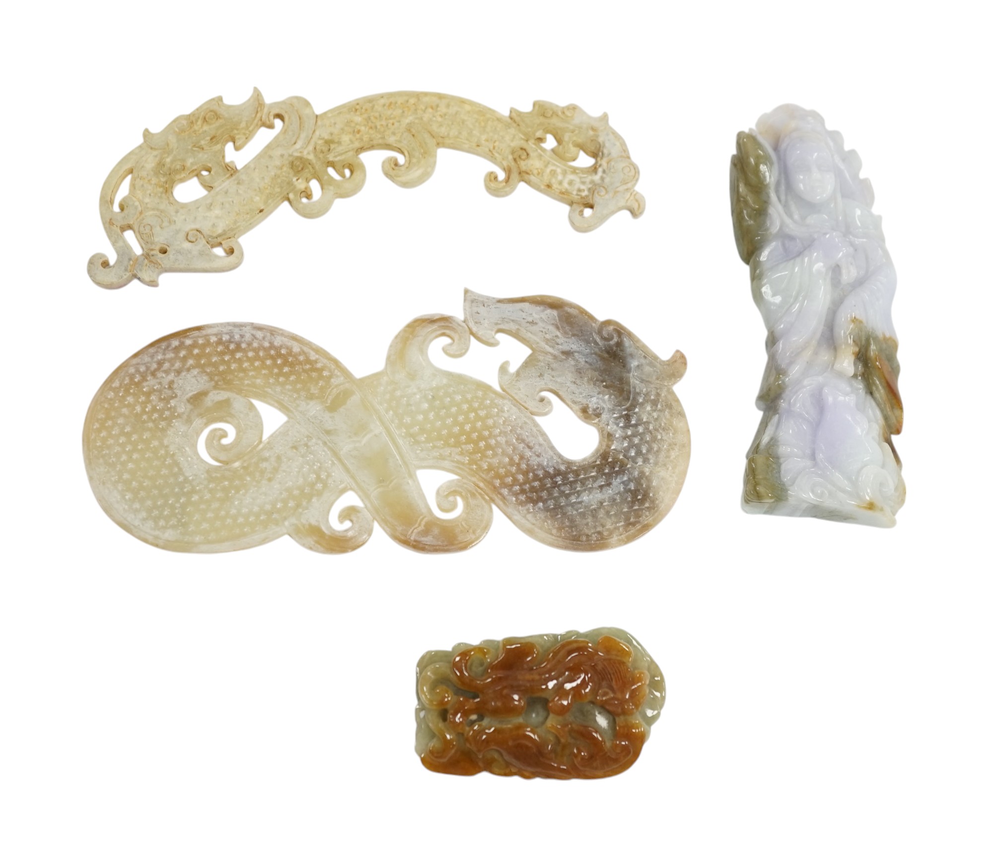 Four Chinese jadeite and hardstone carvings including dragons, largest 16cm in length. Condition - good                                                                                                                     