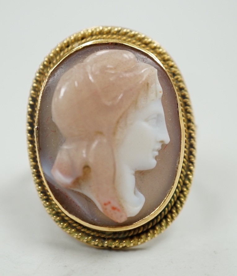 A modern 9ct gold and hardstone cameo ring, carved with the bust of a lady to sinister, size L, gross weight 4.9 grams.                                                                                                     