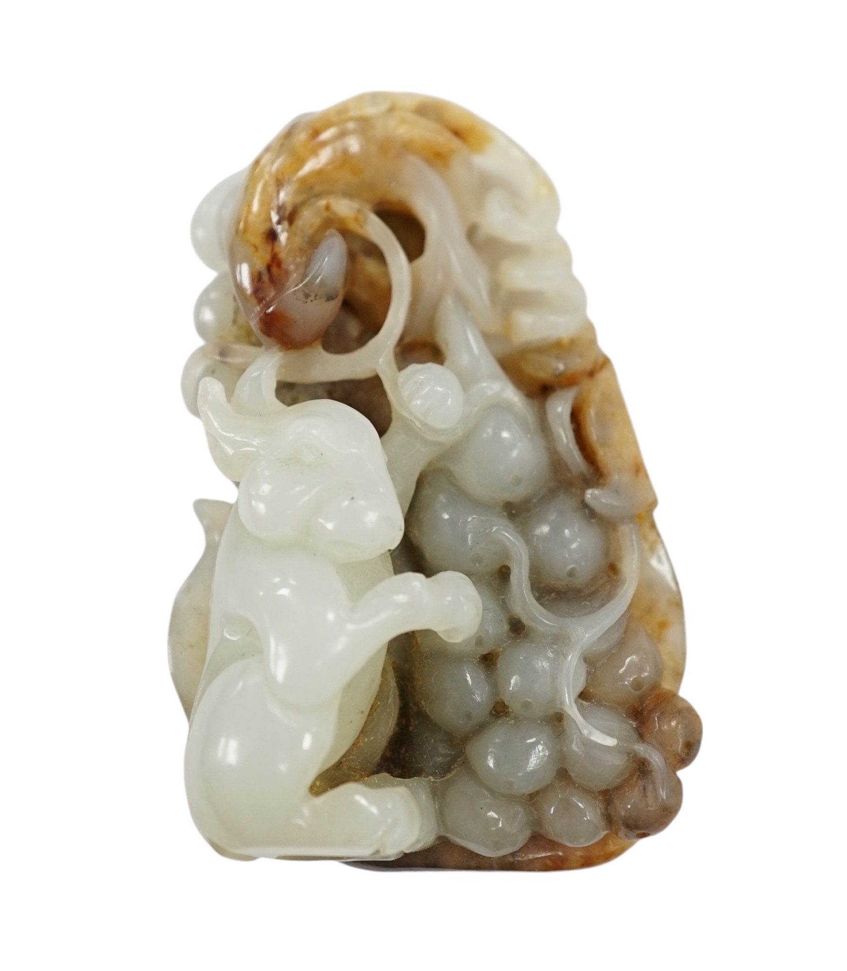 A Chinese russet jade carving of an animal, 6cm high. Condition - good                                                                                                                                                      