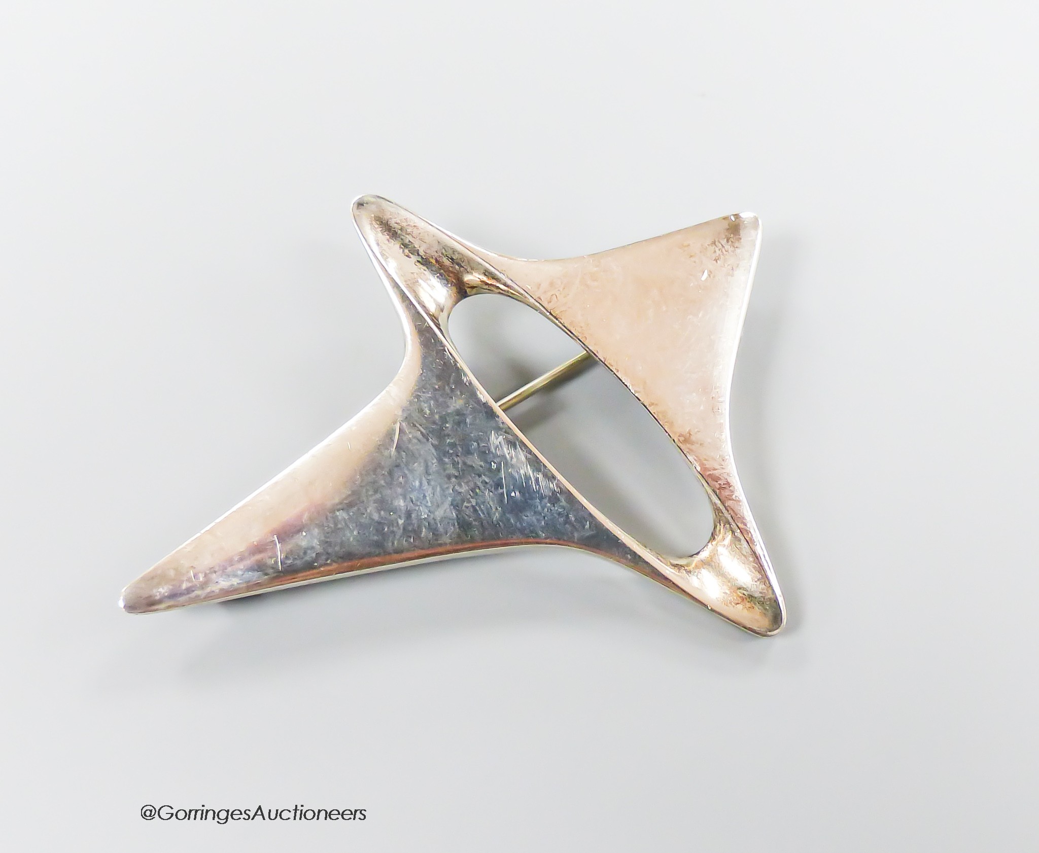 An early 1960's Georg Jensen sterling amorphic brooch, design no. 339, 59mm, 18 grams, with Jensen box.                                                                                                                     