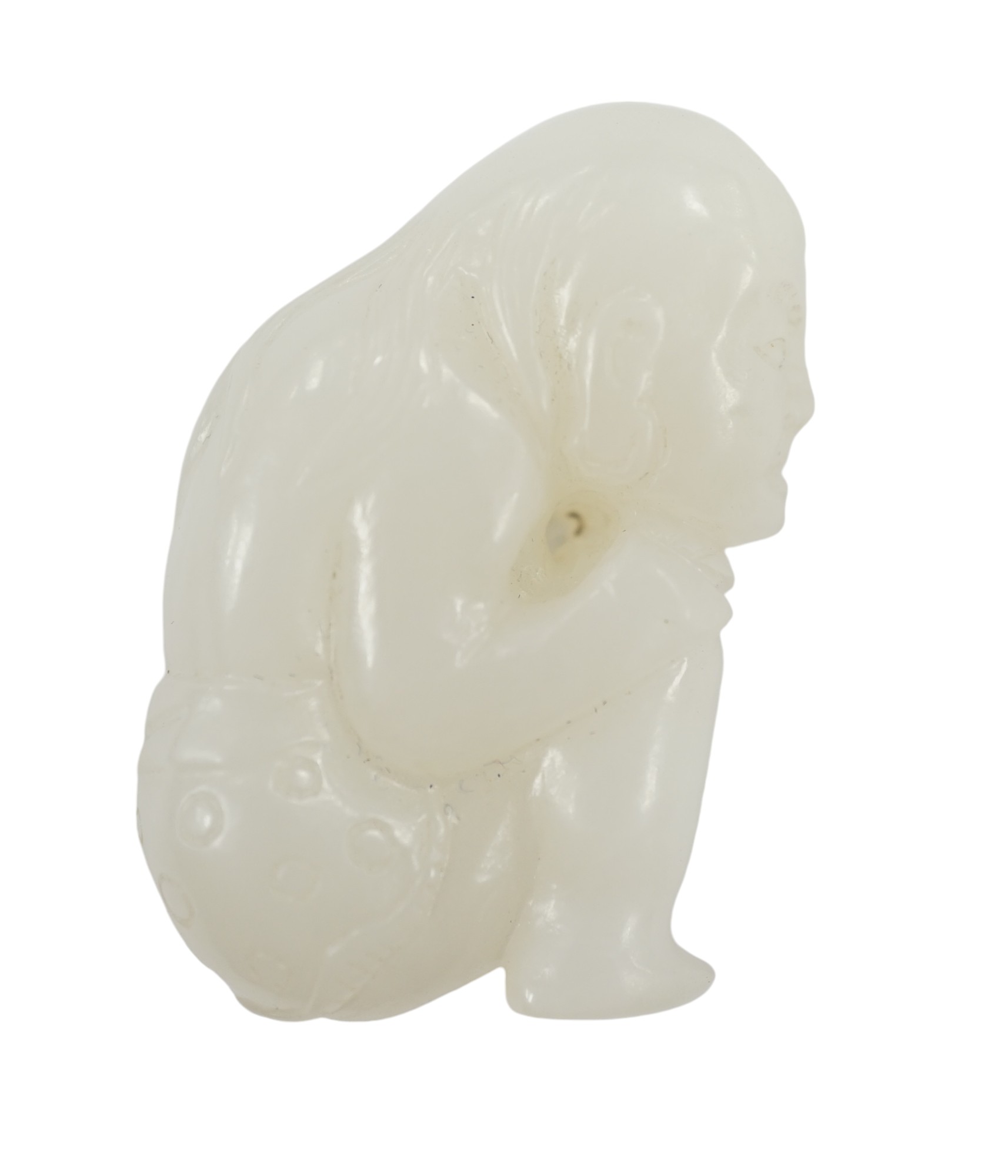 A Chinese white jade carving of a crouching figure, 4.5cm high. Condition - good                                                                                                                                            