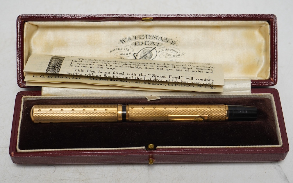 A Waterman's Ideal self-filling fountain pen with 9ct gold overlay, in original box with paperwork. Condition - good                                                                                                        