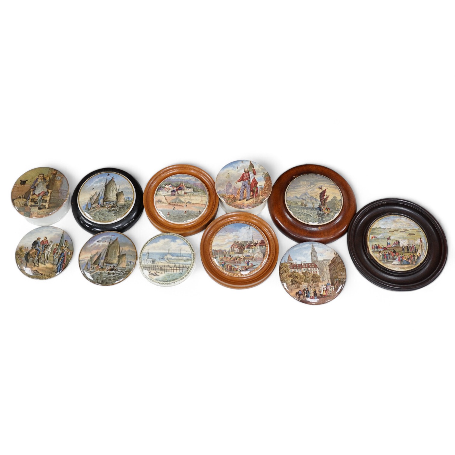 Eleven 19th century mostly framed pot lids including ‘The Ning Po River’, ‘Rifle Contest Wimbledon 1868’, ‘Vue De La Ville De Strasbourg Prise De Port’ etc. Condition - fair to good                                       