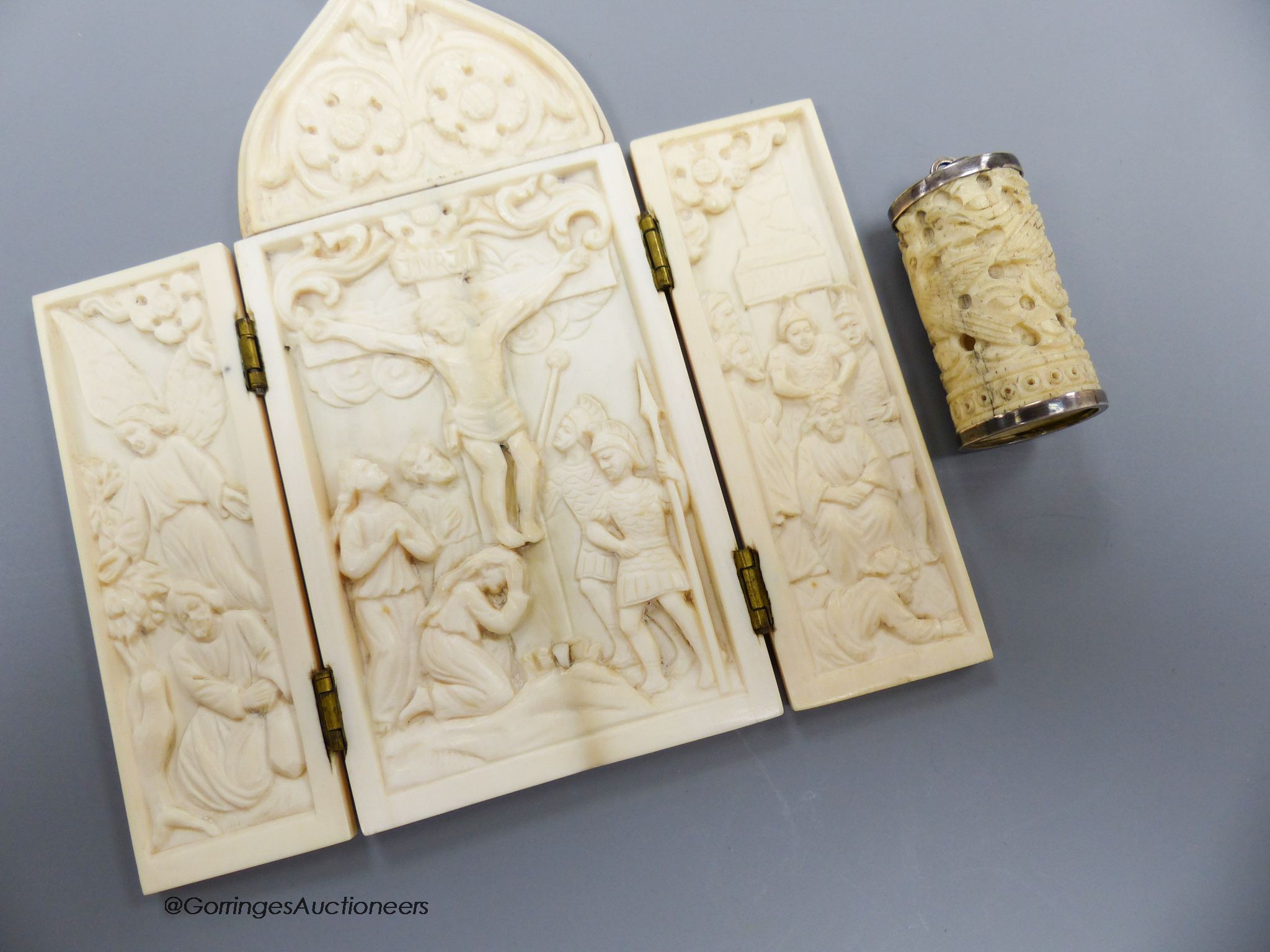 A carved ivory triptych, early 20th century and a carved ivory cover                                                                                                                                                        