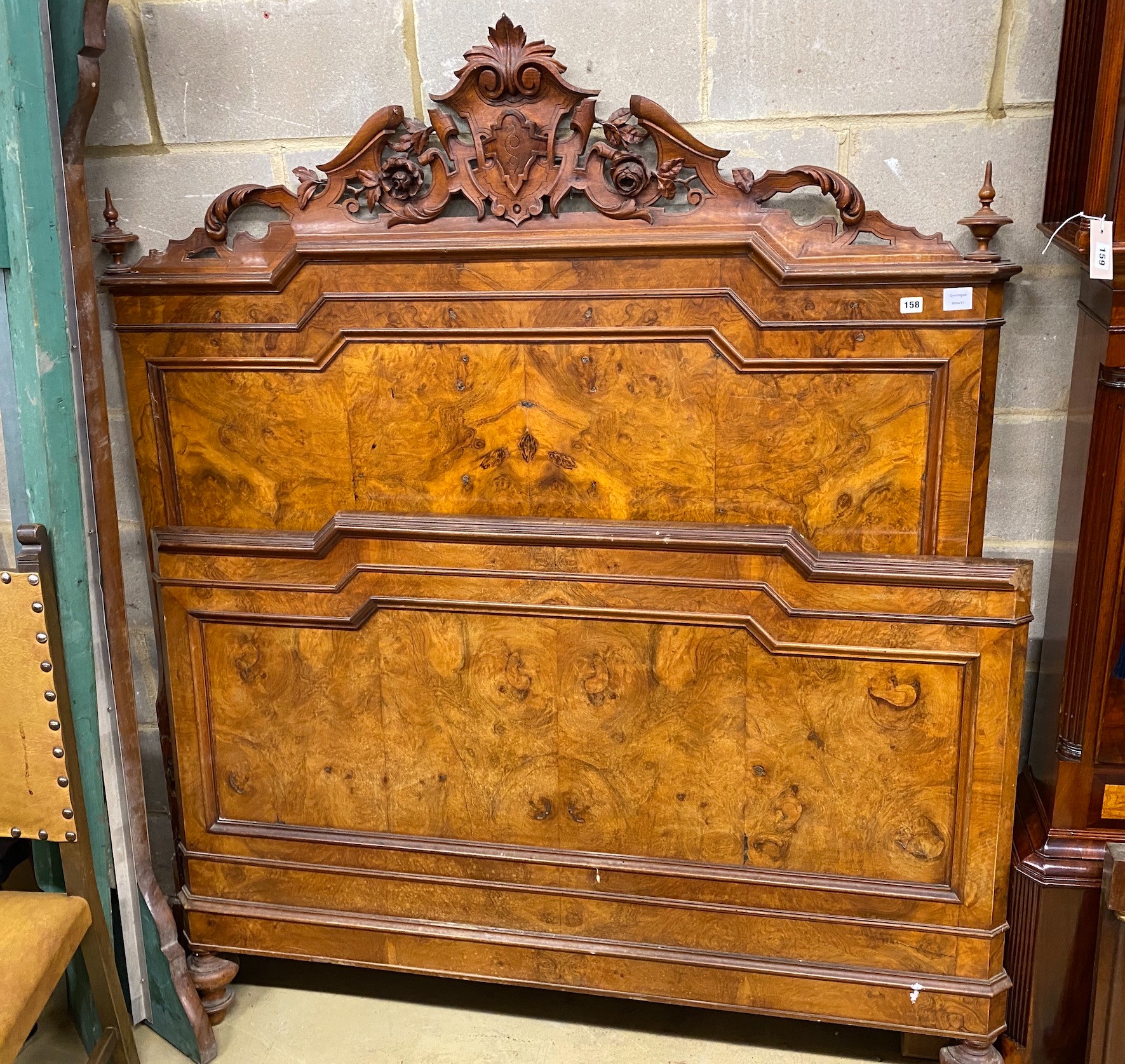 A 19th century French walnut double bed frame, width 150cm, height 178cm                                                                                                                                                    