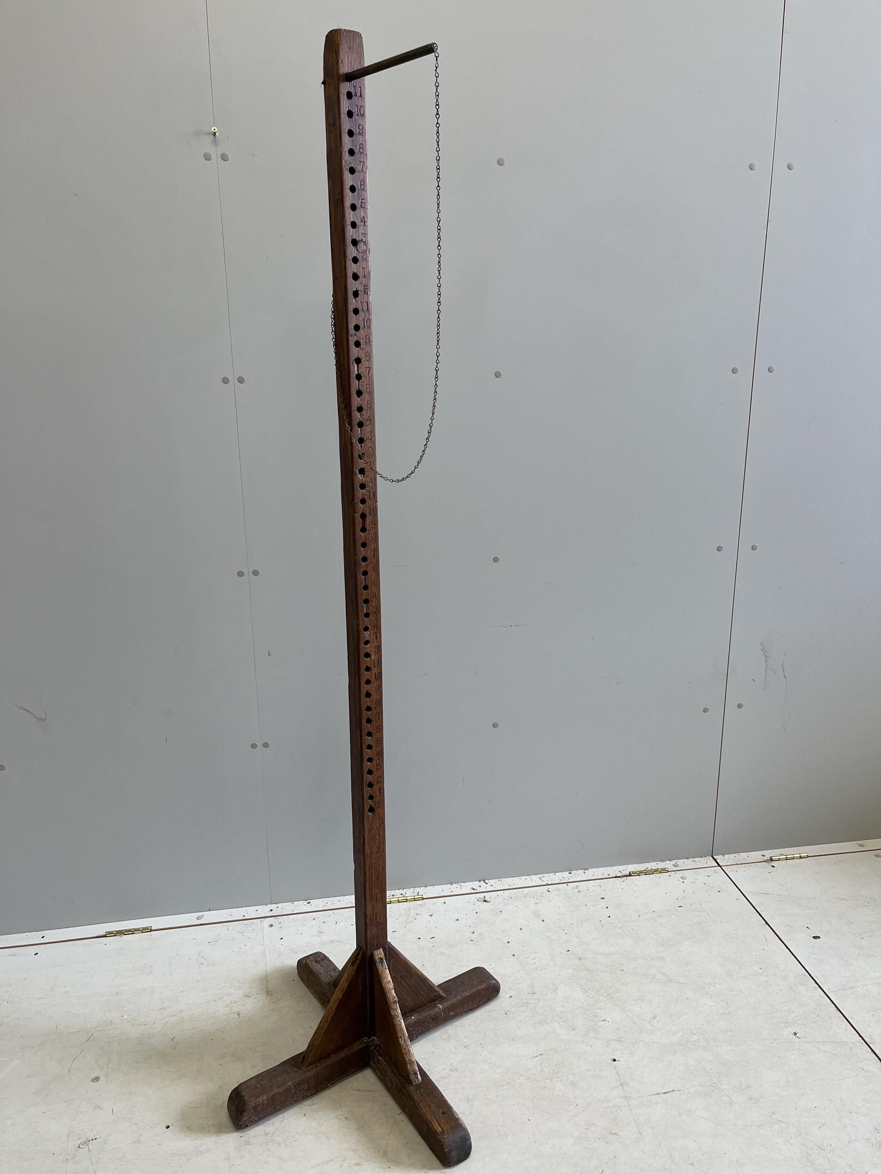 A wooden height measure, height 184cm                                                                                                                                                                                       