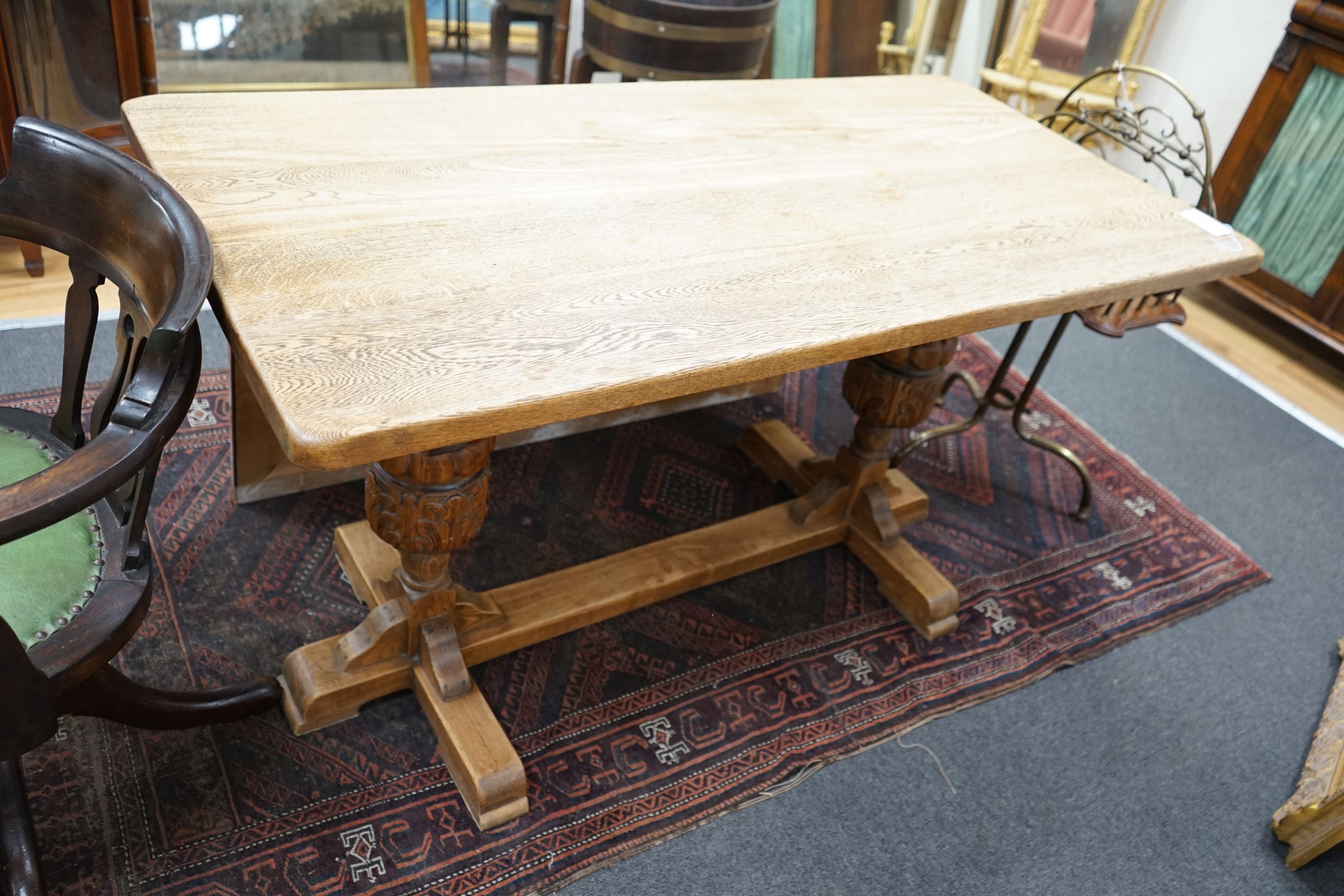 A small 1920s light oak rectangular refectory dining table, width 138cm depth 68cm height 74cm                                                                                                                              