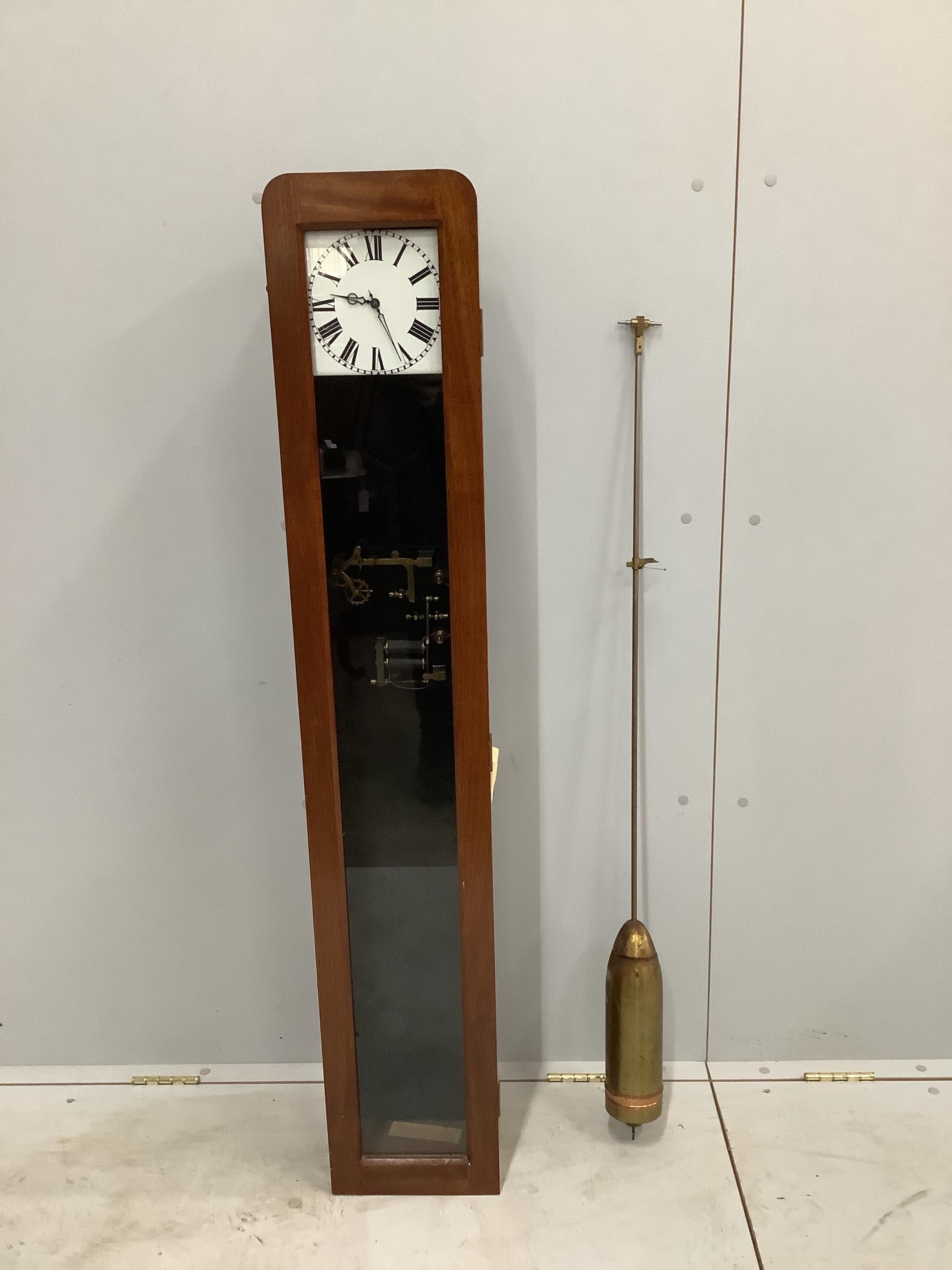 An electric Master clock, height 133cm                                                                                                                                                                                      