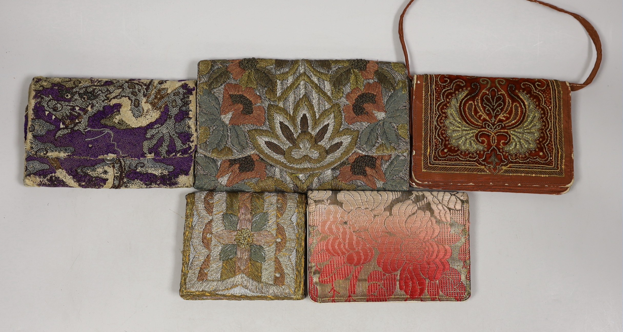 Five various silk and metallic thread embroidered evening bag/purses from 1920’s to 40’s                                                                                                                                    