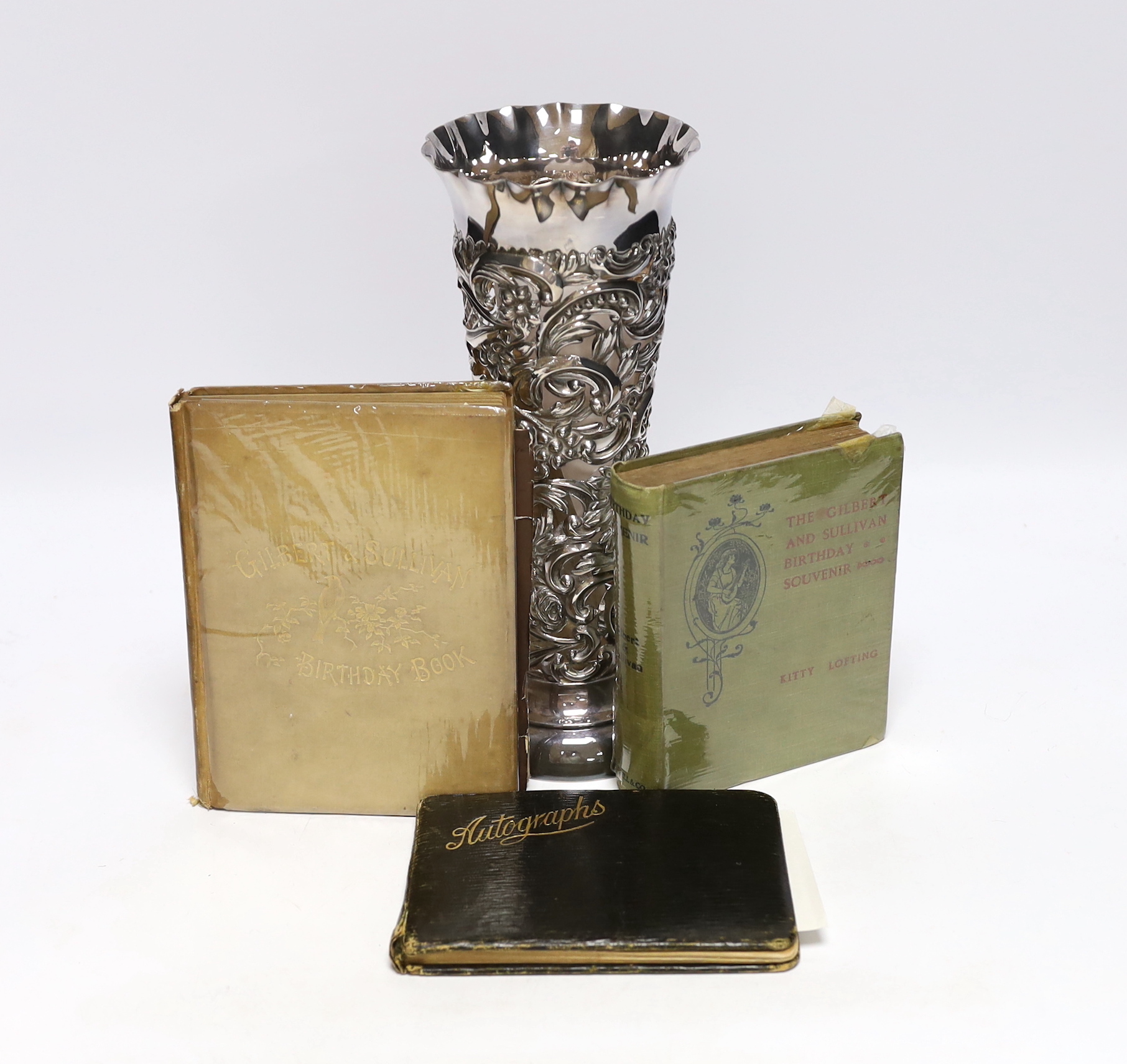 D’Oyly Carte and Gilbert & Sullivan interest; A silver vase by William Comyns with etched dedication; ‘Alice, from Arthur Sullivan 9 June 1892’, hallmarked London 1891, together with a 1920s autograph book of D’Oyly Cart