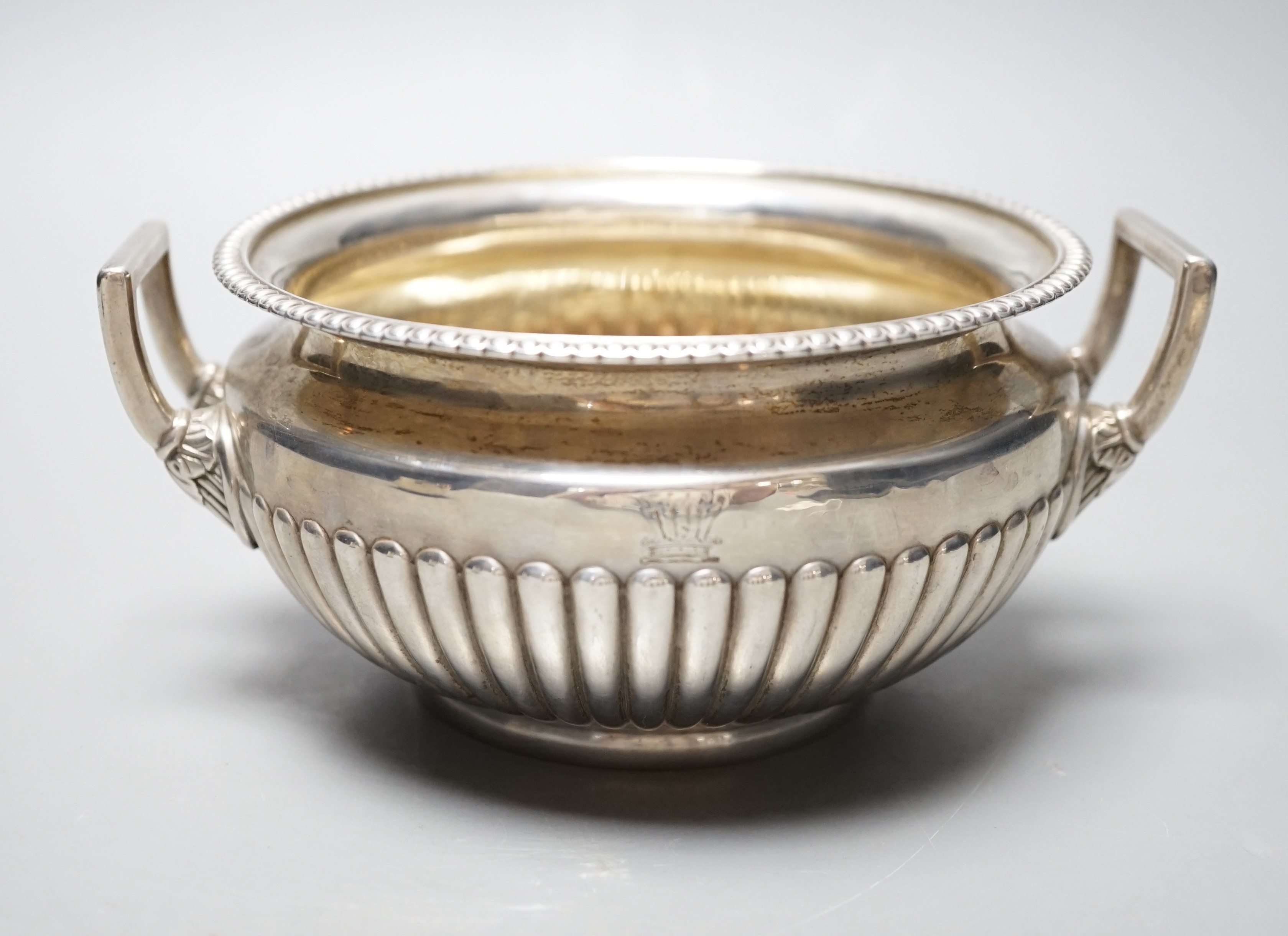 A George III demi fluted silver two handled sugar bowl, Burwash & Sibley, London, 1811, 16.8cm over handles                                                                                                                 