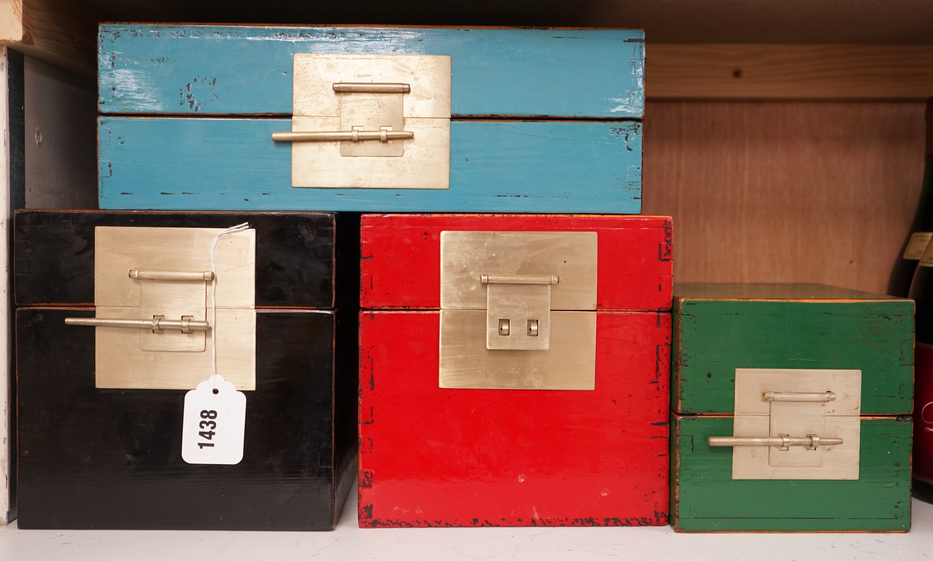 Four Chinese coloured lacquer boxes, largest turquoise box 35cms wide x 12cms high                                                                                                                                          