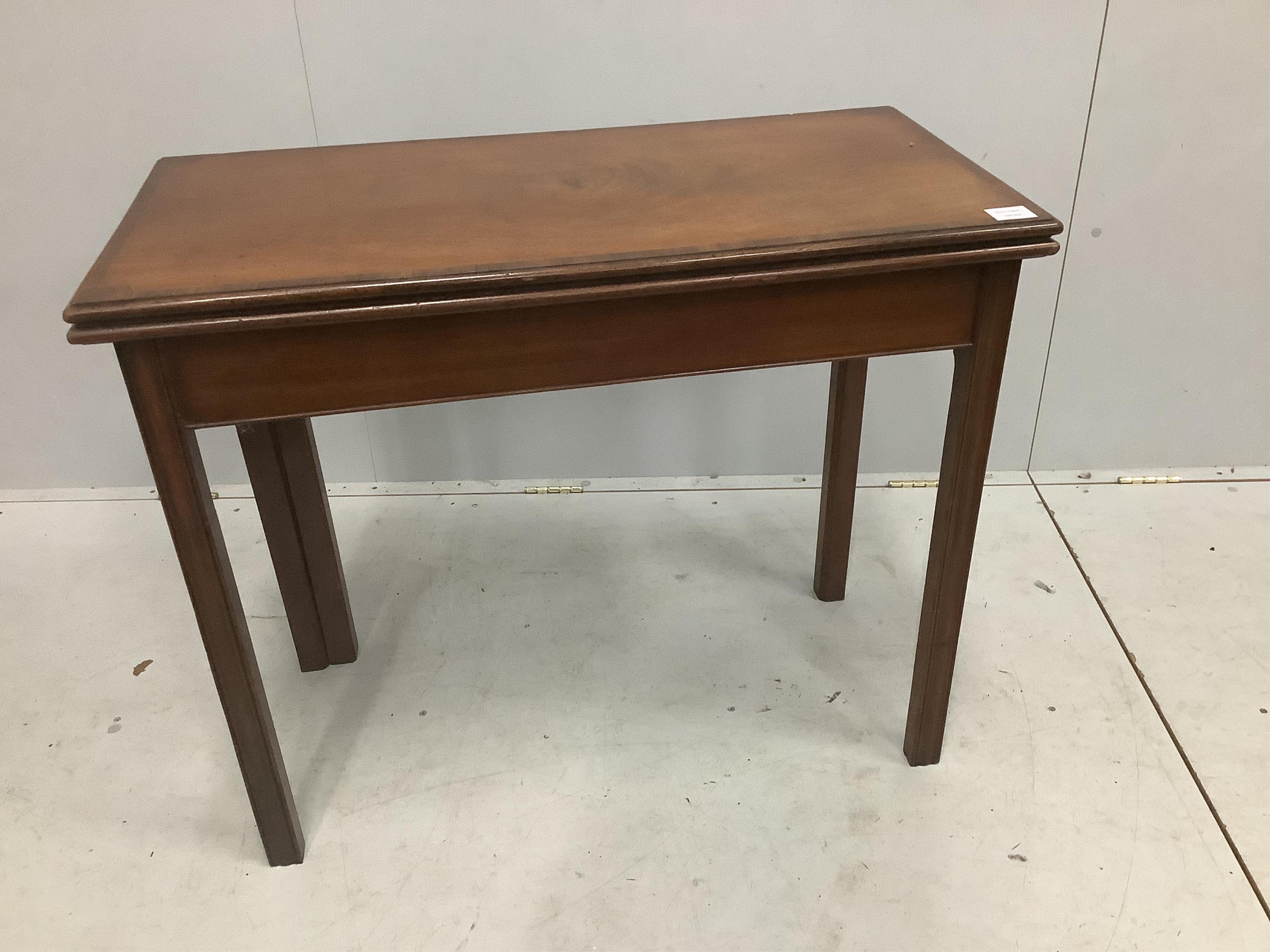 A George III rectangular banded mahogany folding card table, width 91cm, depth 45cm, height 76cm. Condition - good                                                                                                          