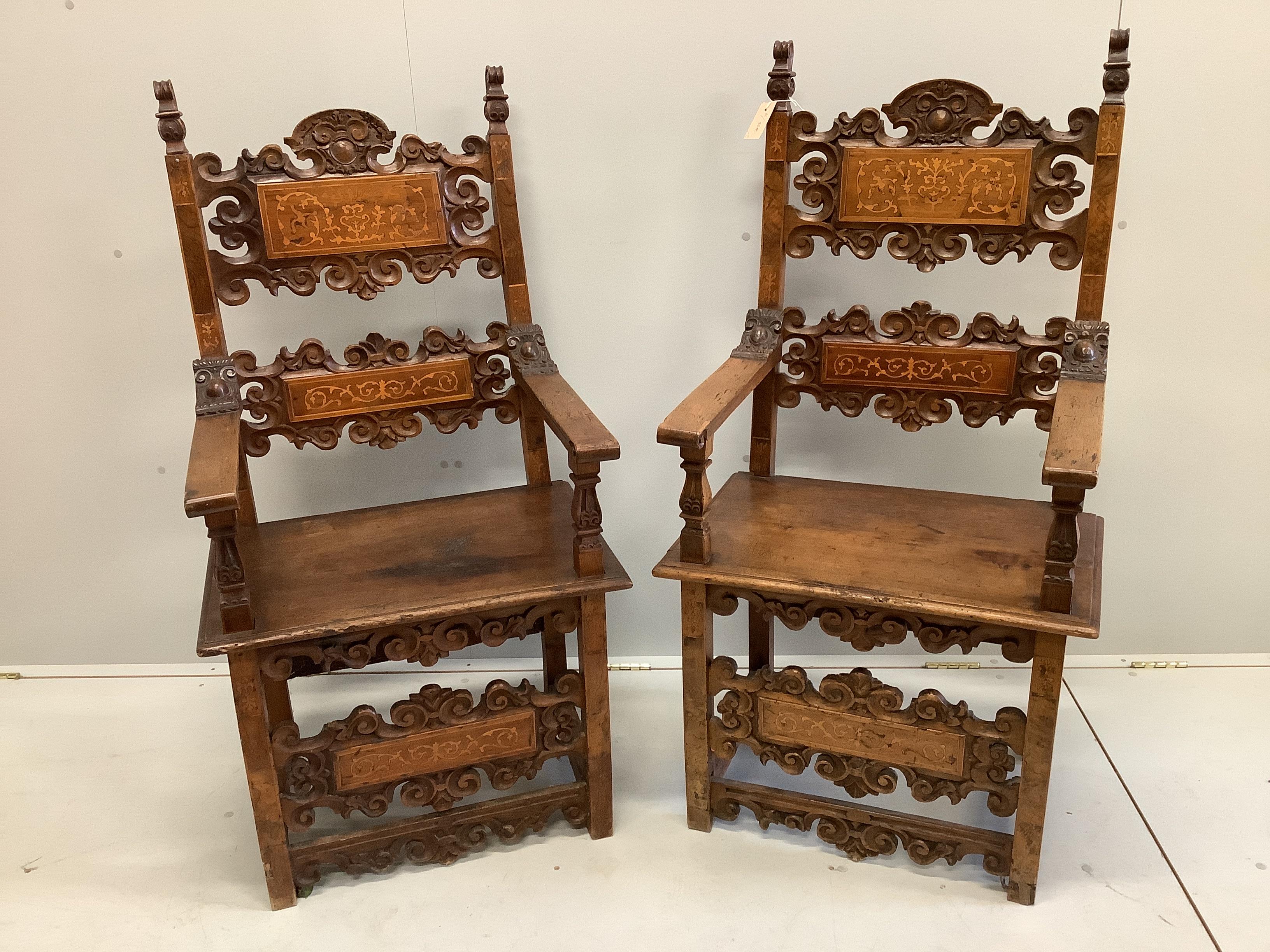 A pair of 18th century style carved inlaid walnut elbow chairs, width 57cm, depth 49cm, height 124cm                                                                                                                        