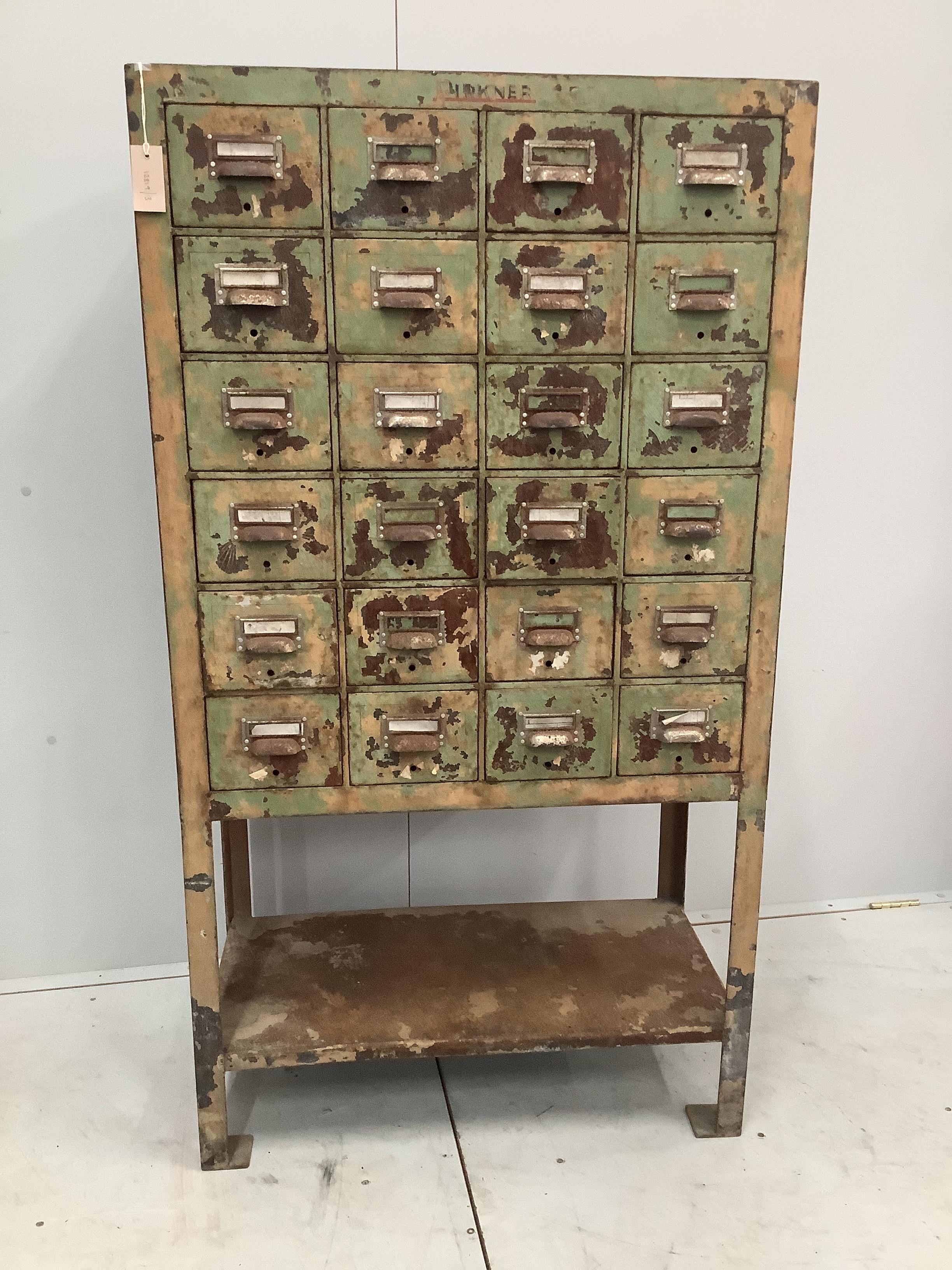 An industrial style painted metal twenty-four drawer filing chest, width 80cm, depth 40cm, height 145cm                                                                                                                     
