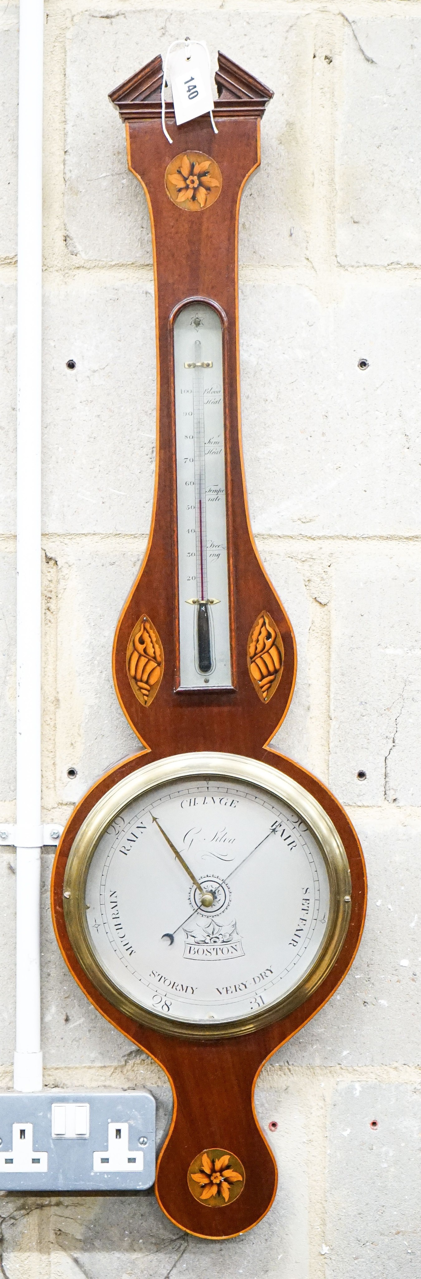 A George III inlaid mahogany wheel barometer, marked Silva, Boston, height 98cm                                                                                                                                             