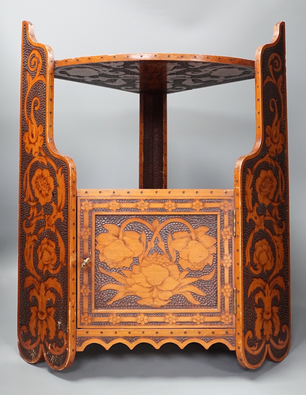 A pokerwork hanging corner cabinet, 58cm                                                                                                                                                                                    