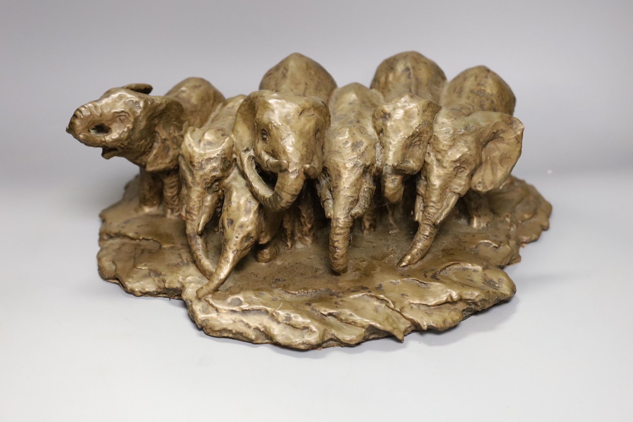 A bronzed terracotta elephant sculpture by Mary Lindon, 40cm wide                                                                                                                                                           