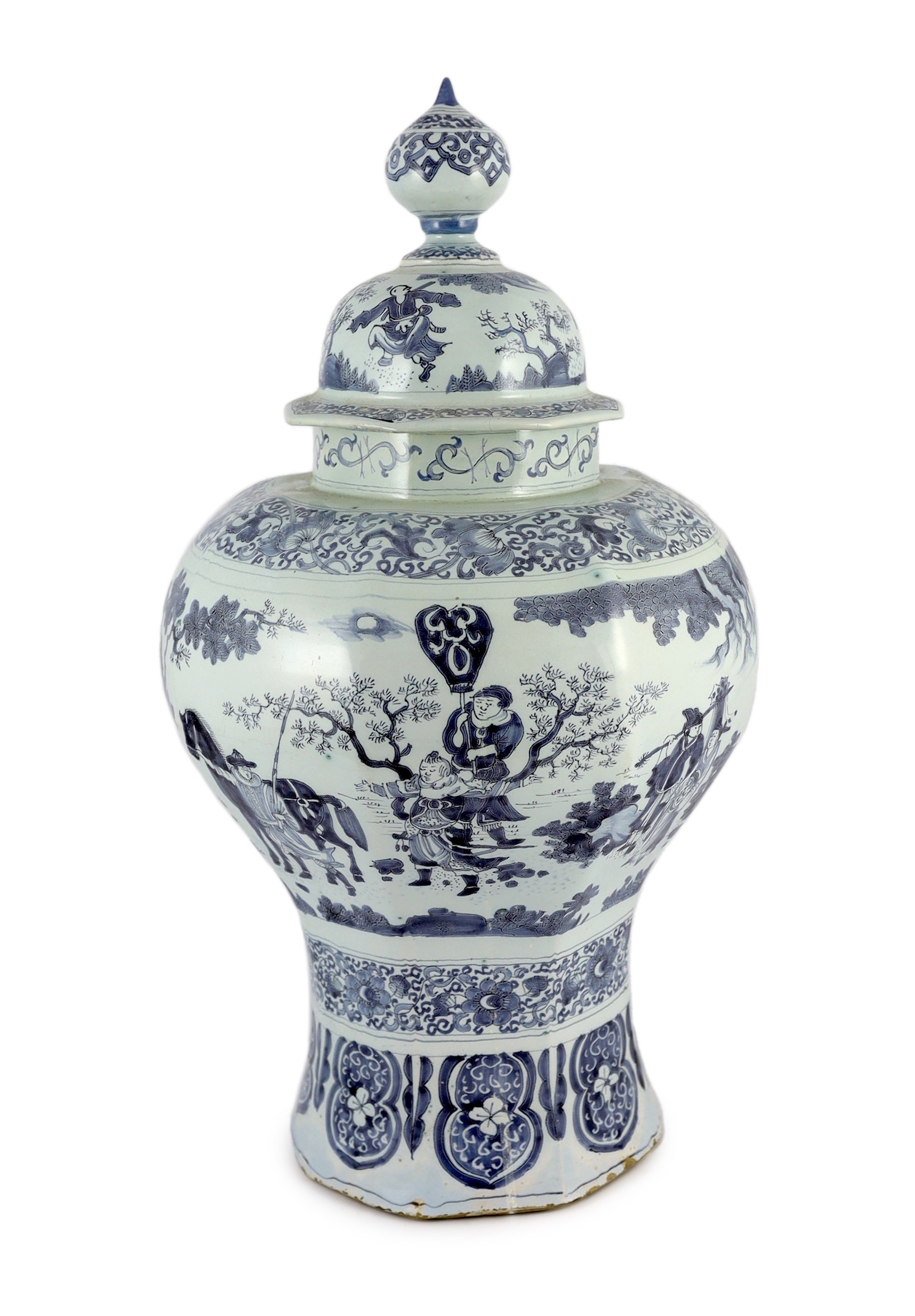 A massive Delft blue and white inverted baluster vase and cover, c.1700, 57.5cm high, neck and cover restored                                                                                                               