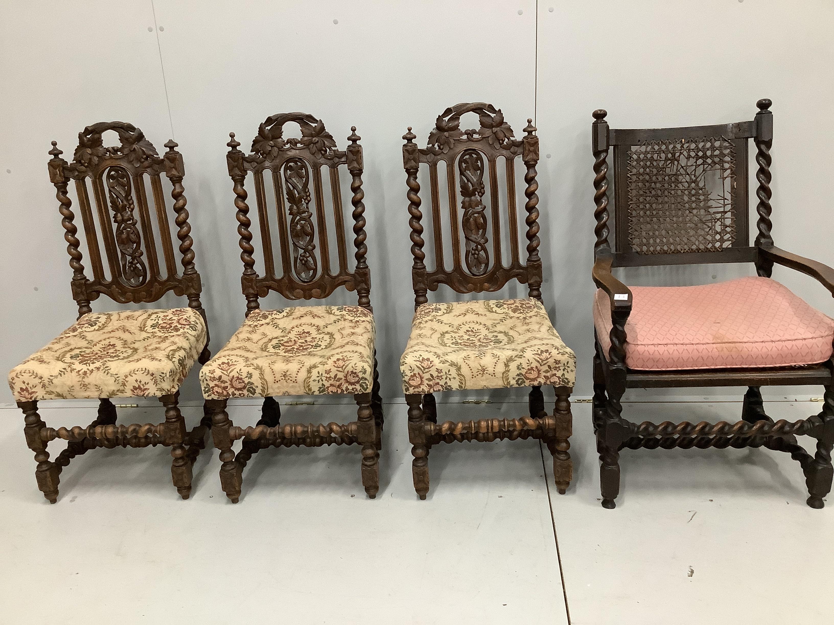 A Carolean style oak elbow chair and three vine carved oak dining chairs                                                                                                                                                    