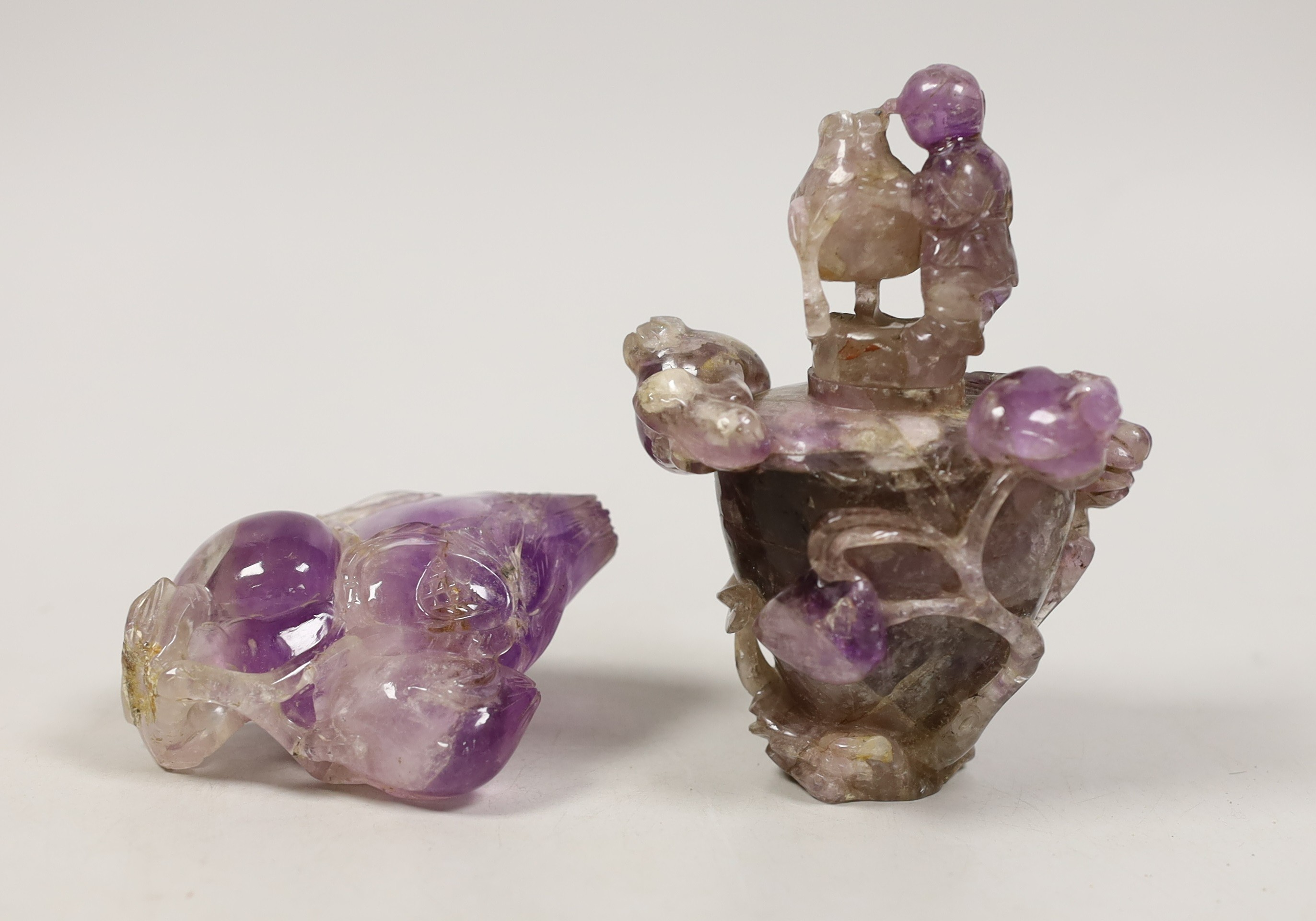 Two Chinese amethyst crystal carvings of peaches and a vase, tallest 8.5 cm                                                                                                                                                 