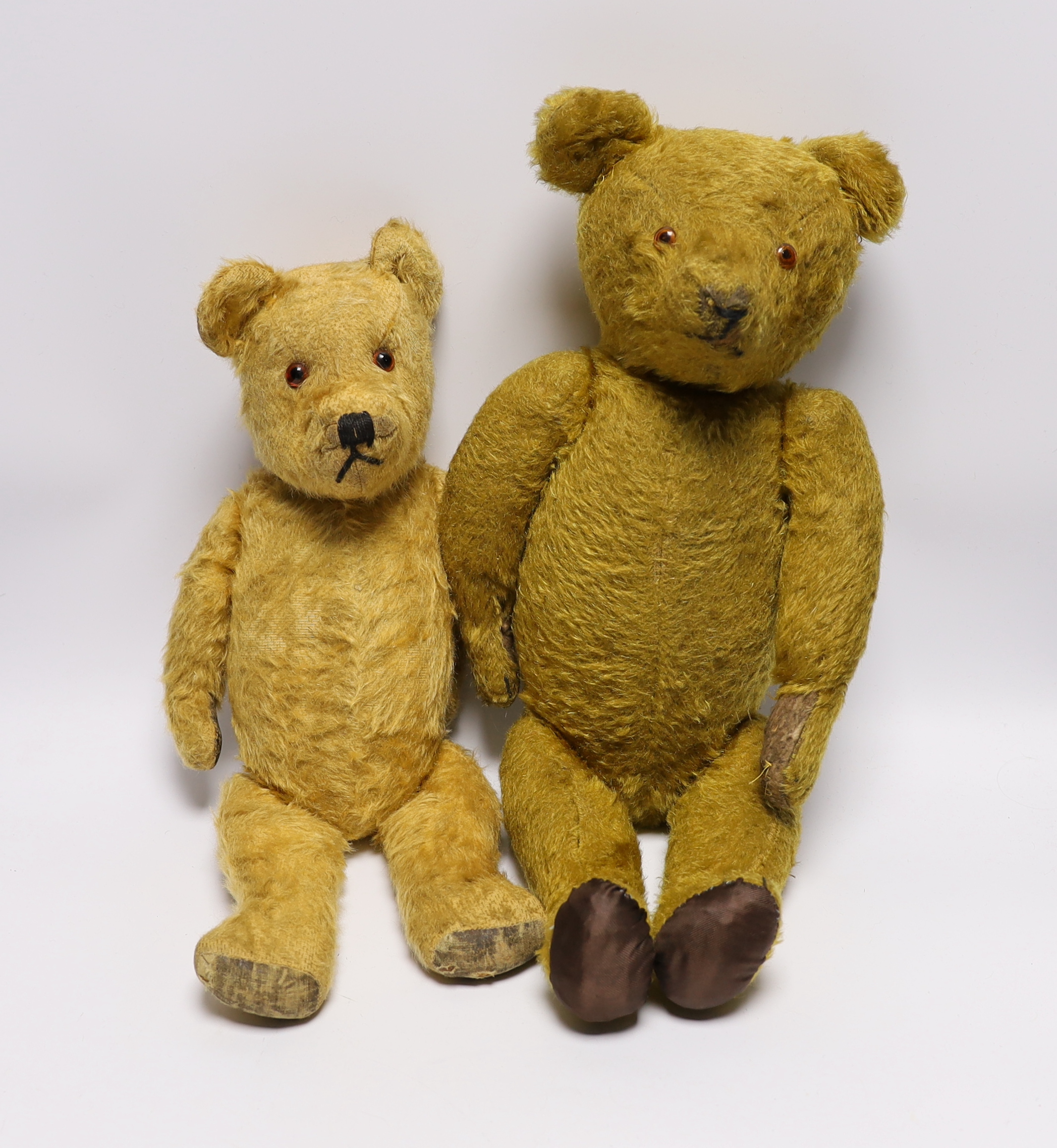 A 1930's German bear with 'set in' ears and a 1950's English Chiltern bear (2)                                                                                                                                              