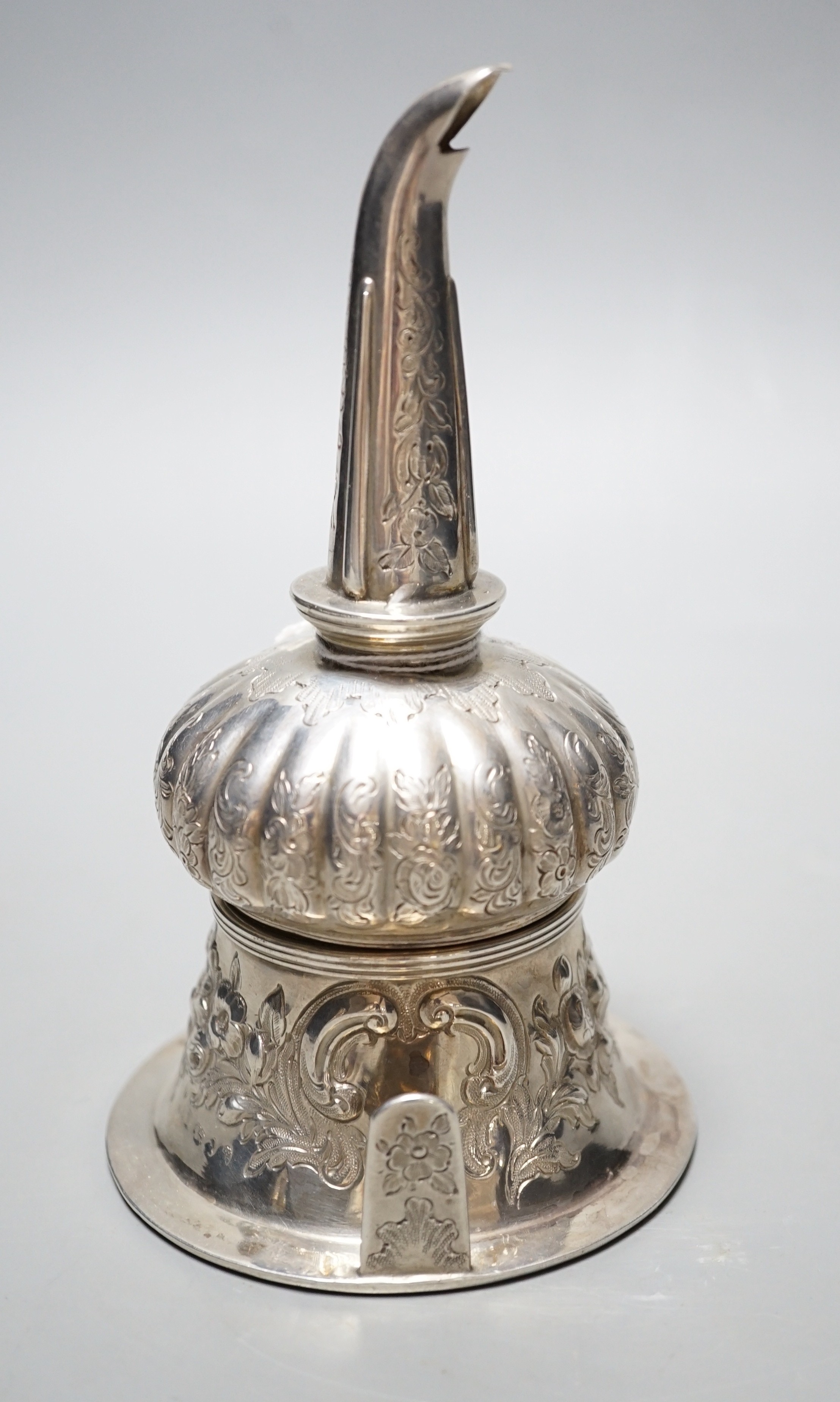 A George III silver wine funnel, with later? embossed and engraved decoration, John Watson & Son, Sheffield, 1817, 15.6cm.                                                                                                  