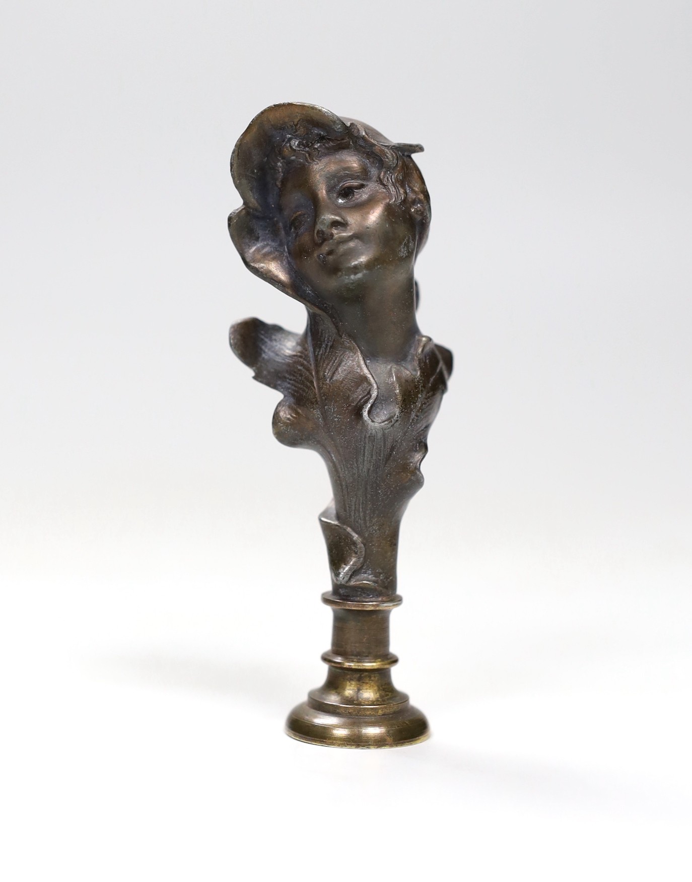 An Art Nouveau bust seal, signed Anglos, 10cm                                                                                                                                                                               